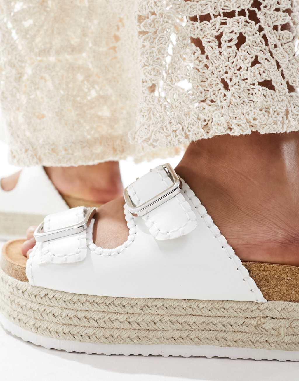 ASOS DESIGN Traffic double buckle flatform mules in white Product Image