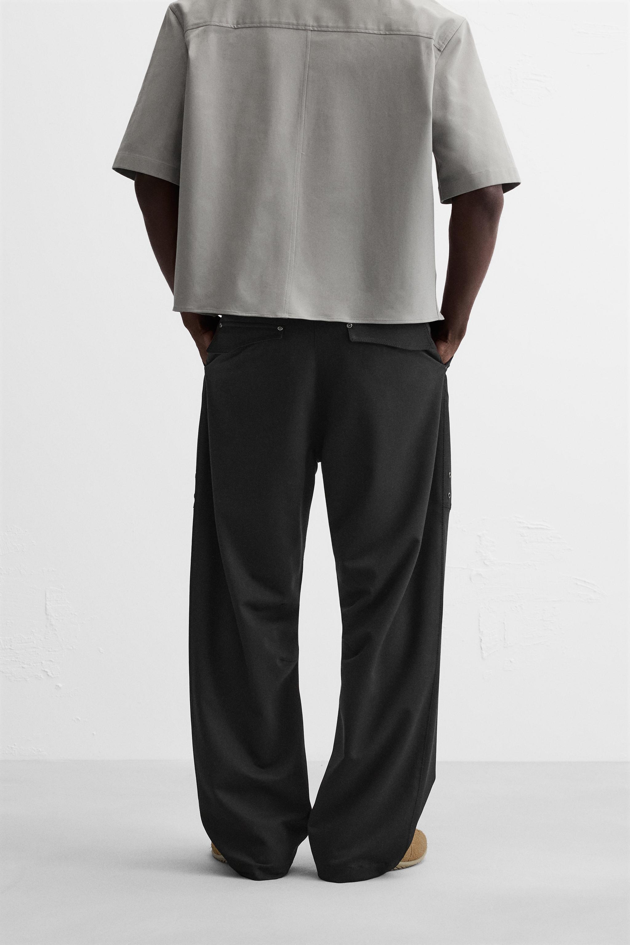 FLARED FIT PANTS WITH SEAMS Product Image