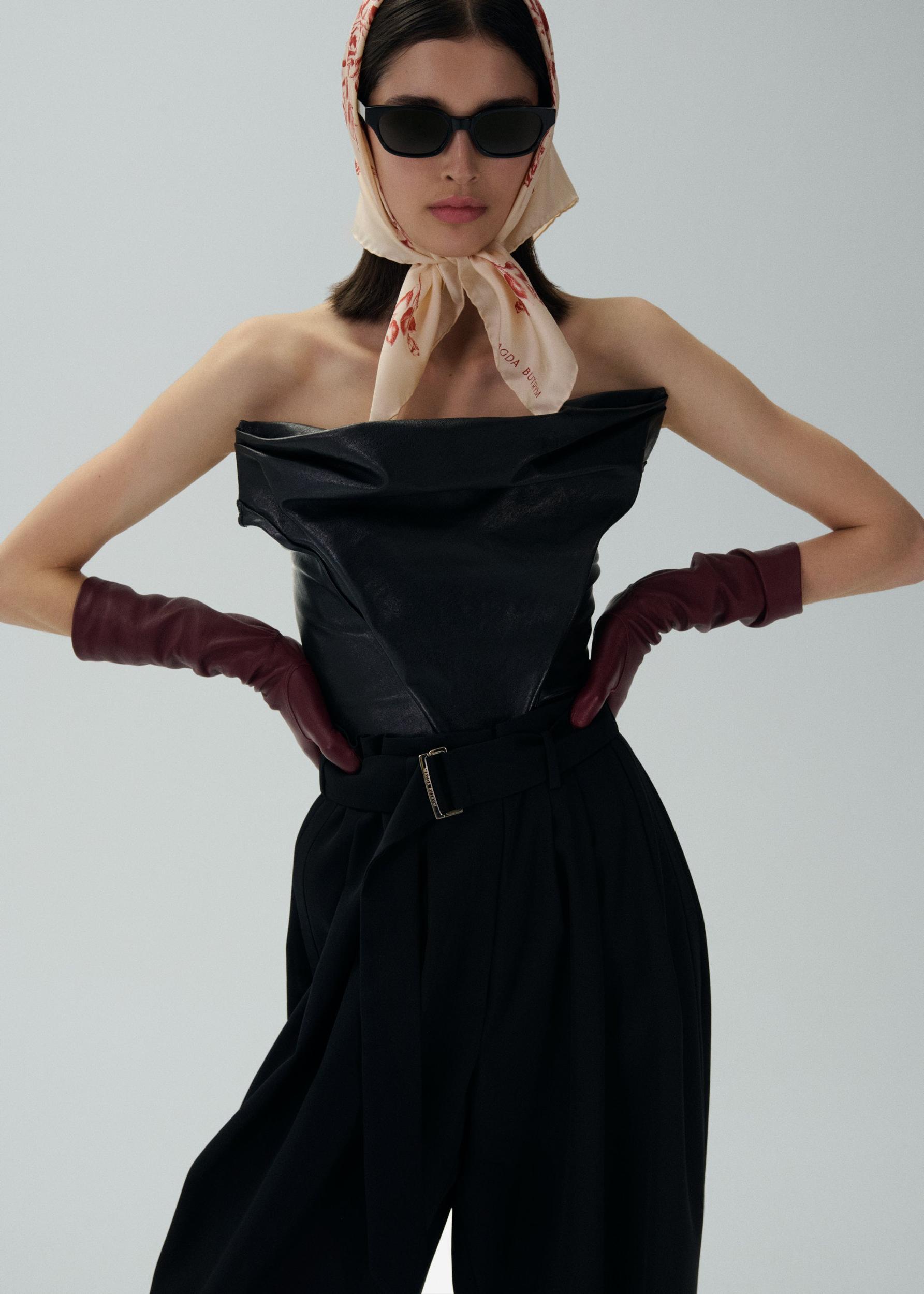 Wide belted tapered trousers in black Product Image