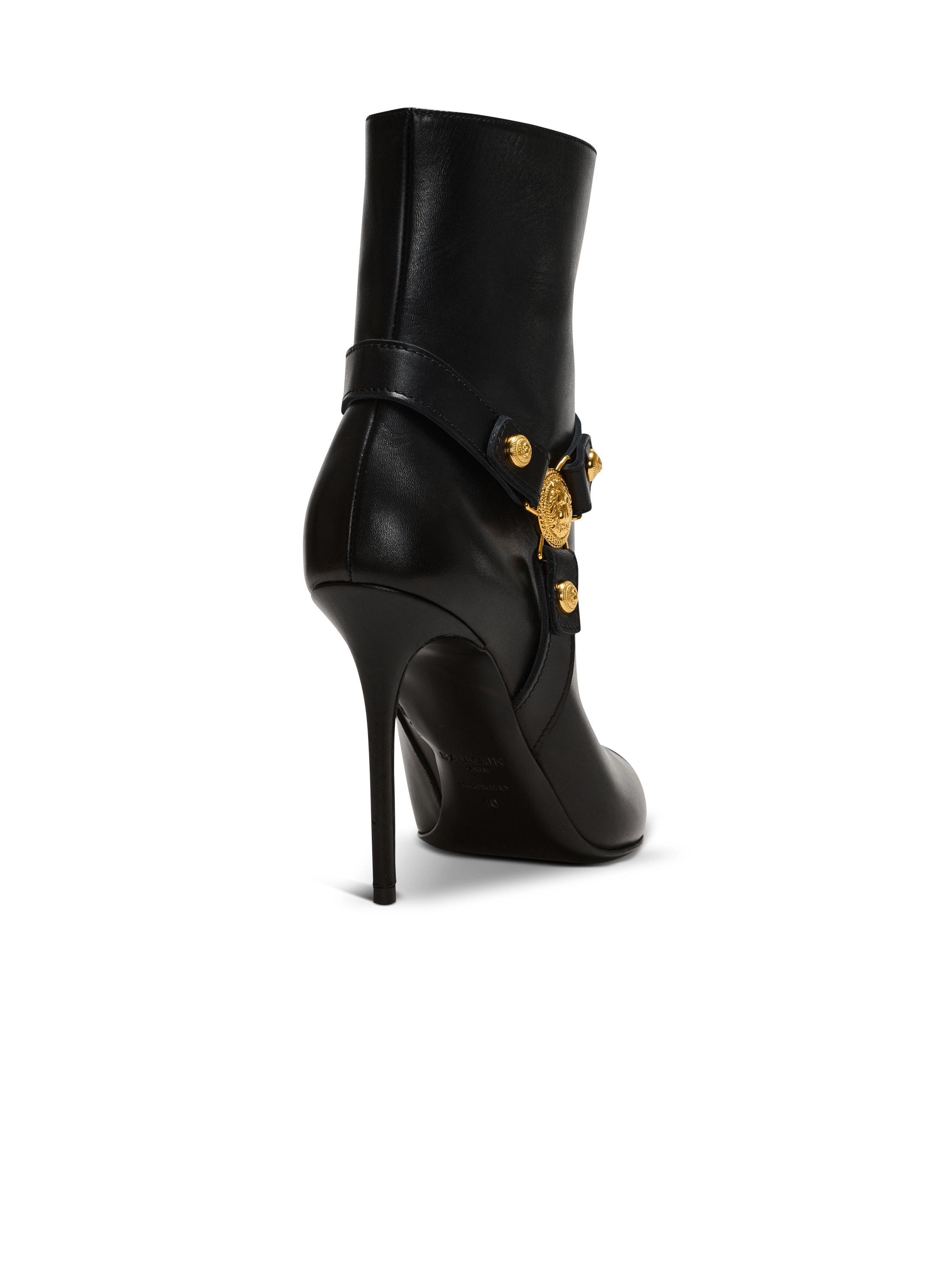 Heeled calfskin Eva ankle boots Product Image