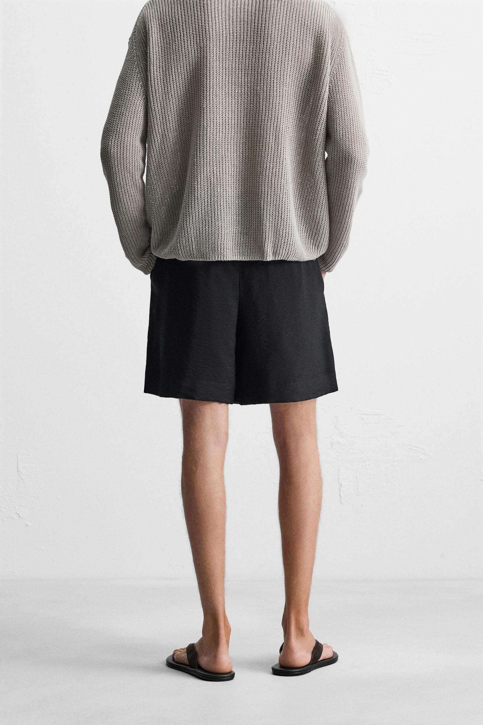 FLOWY RELAXED FIT BERMUDA SHORTS Product Image