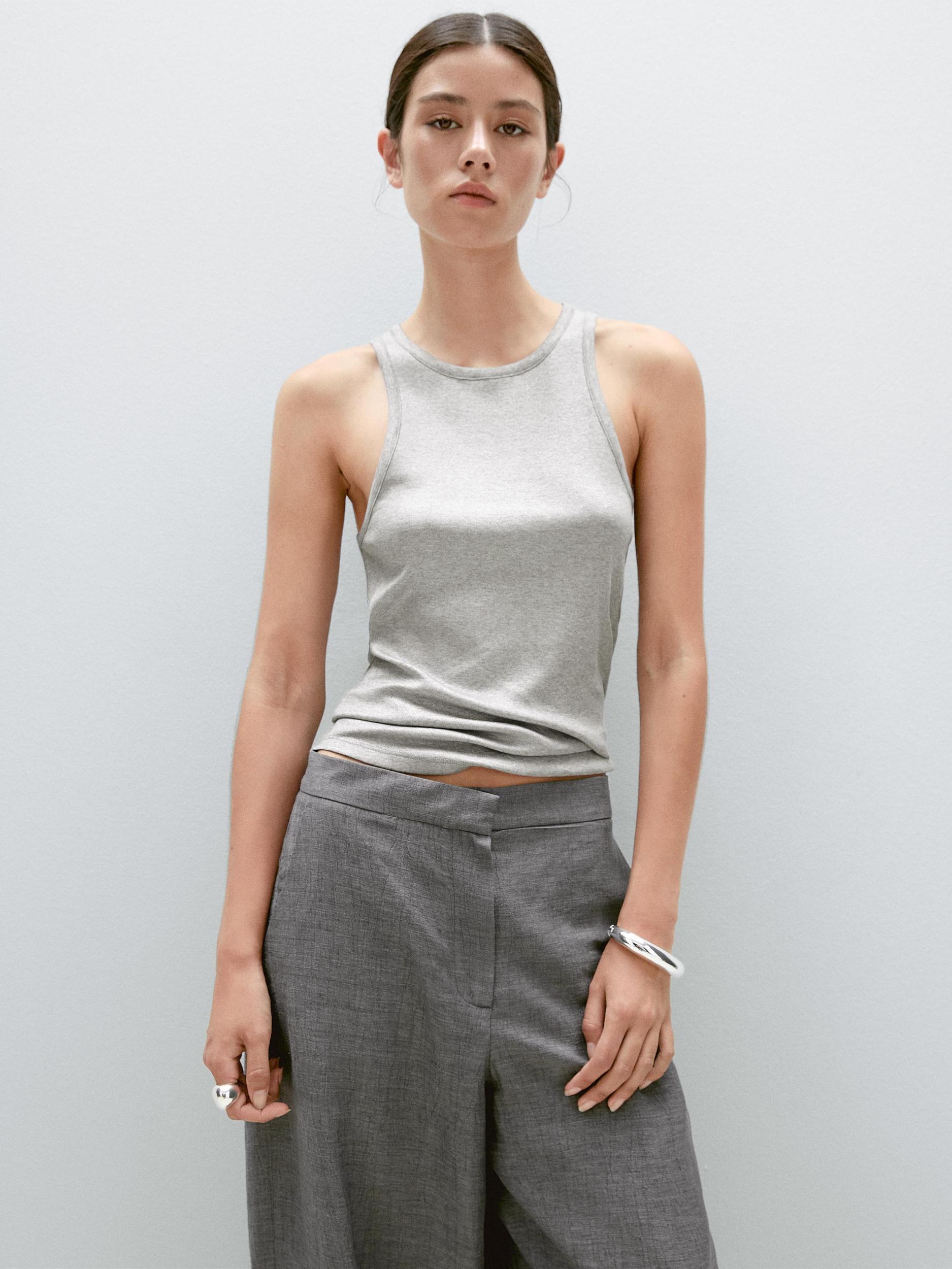 Balloon fit trousers with button details Product Image