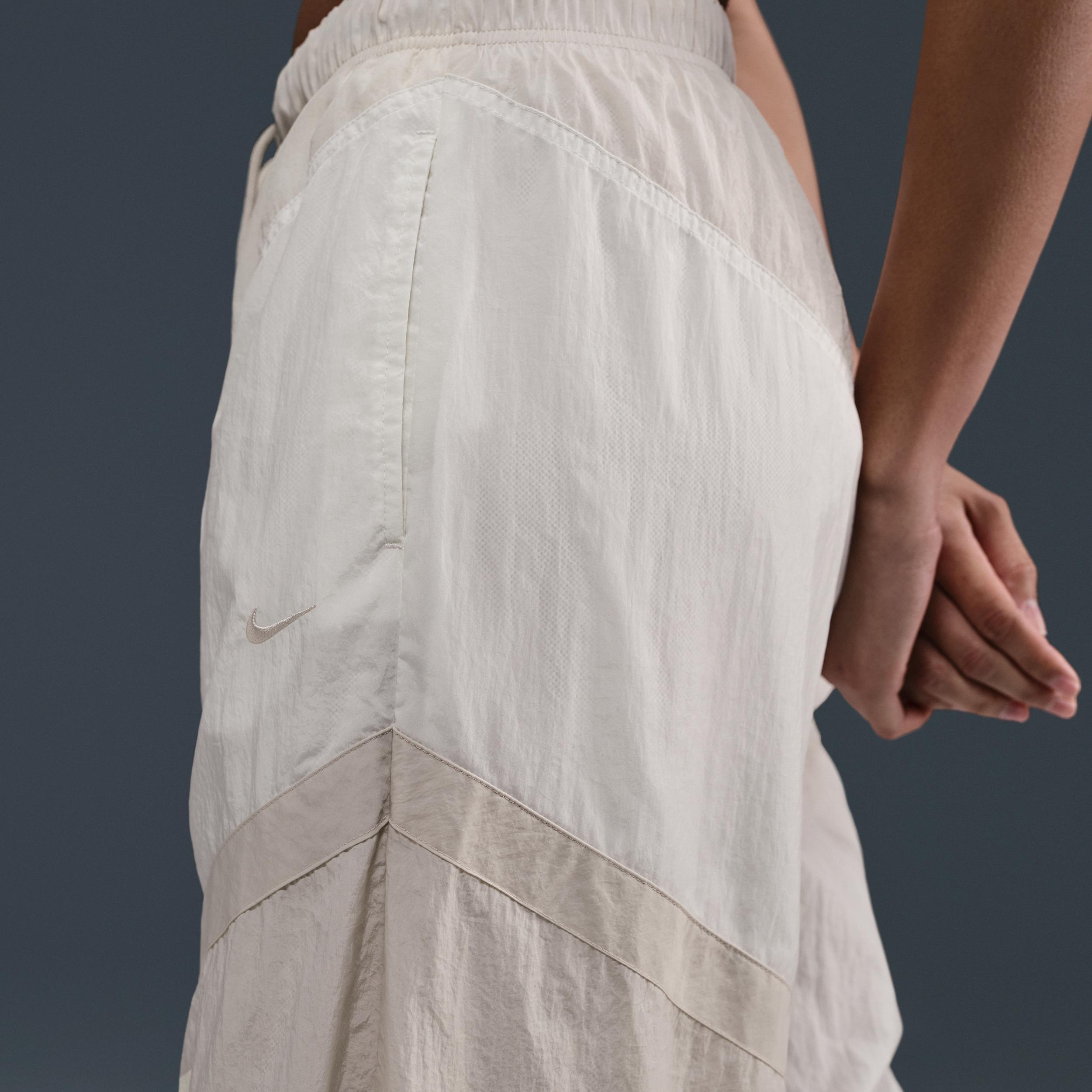 Nike Womens Sportswear Street Mid-Rise Loose Woven Open-Hem Pants in Sail/Light Orewood Brown/Light Orewood Brown Product Image