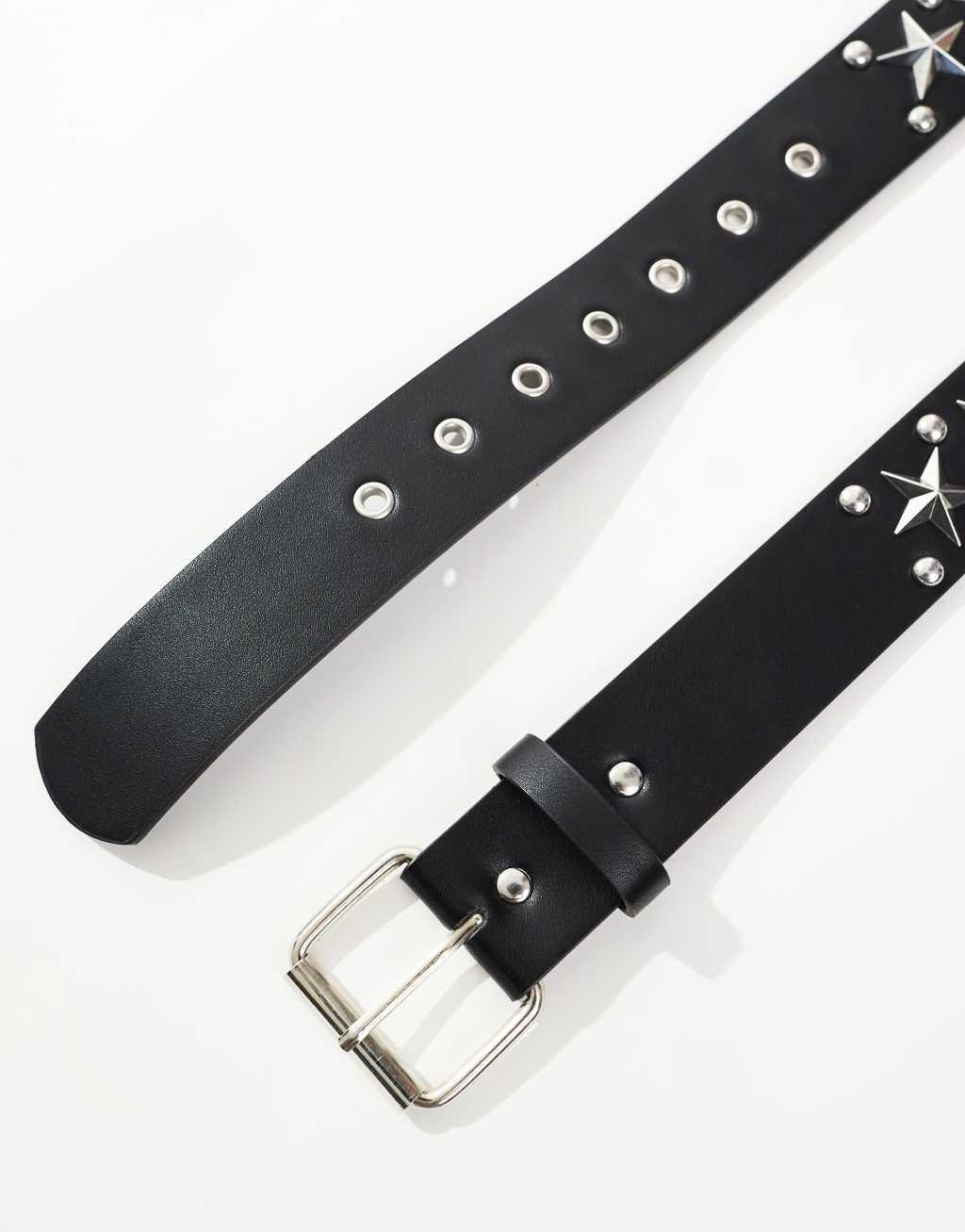 ASOS DESIGN faux leather belt with star studs and silver roller buckle in black Product Image