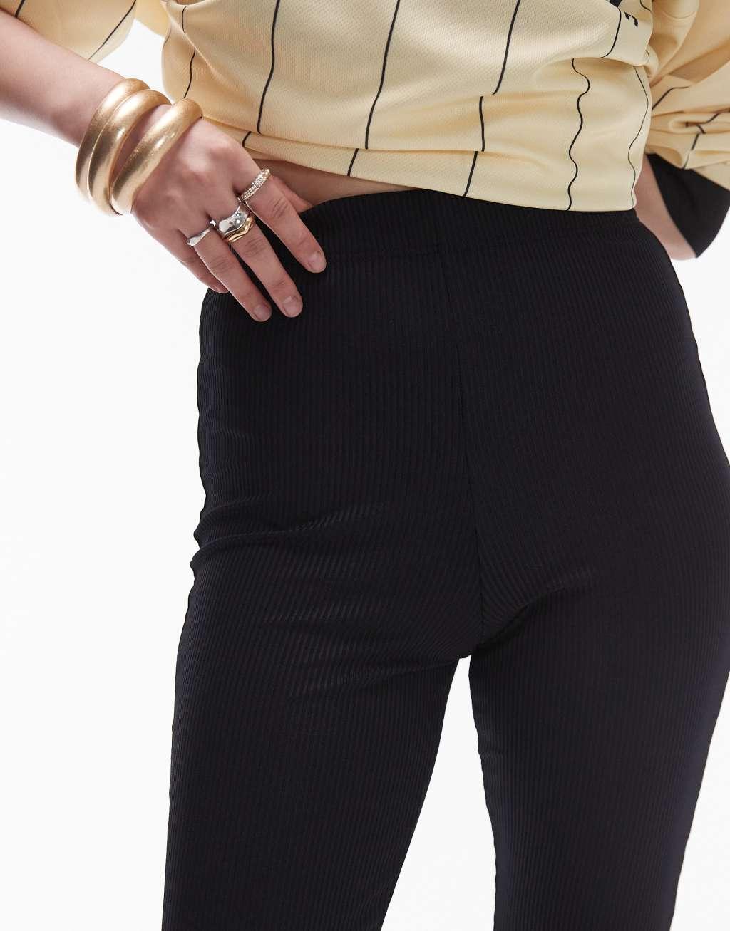 Topshop Petite skinny ribbed flared pants in black Product Image