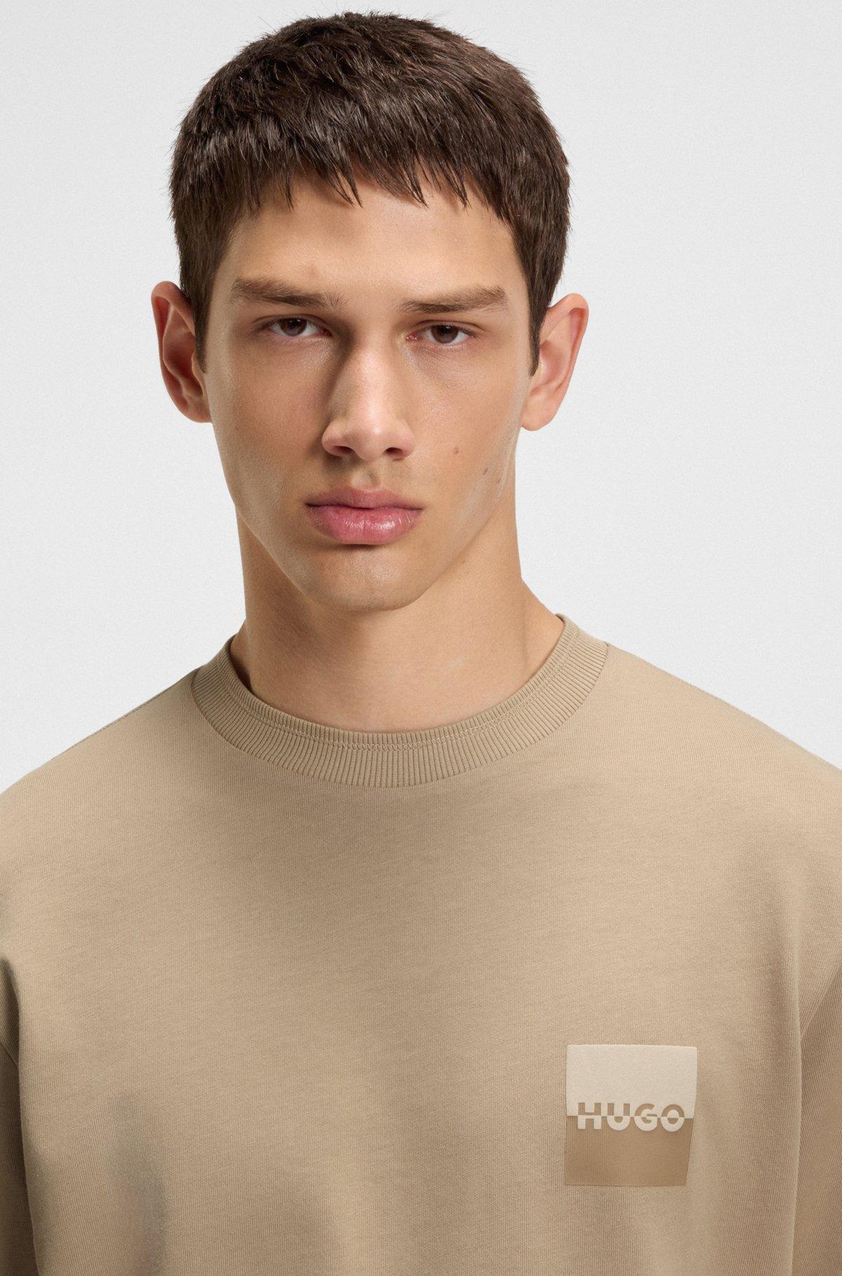 Relaxed-fit T-shirt in cotton with split logos Product Image