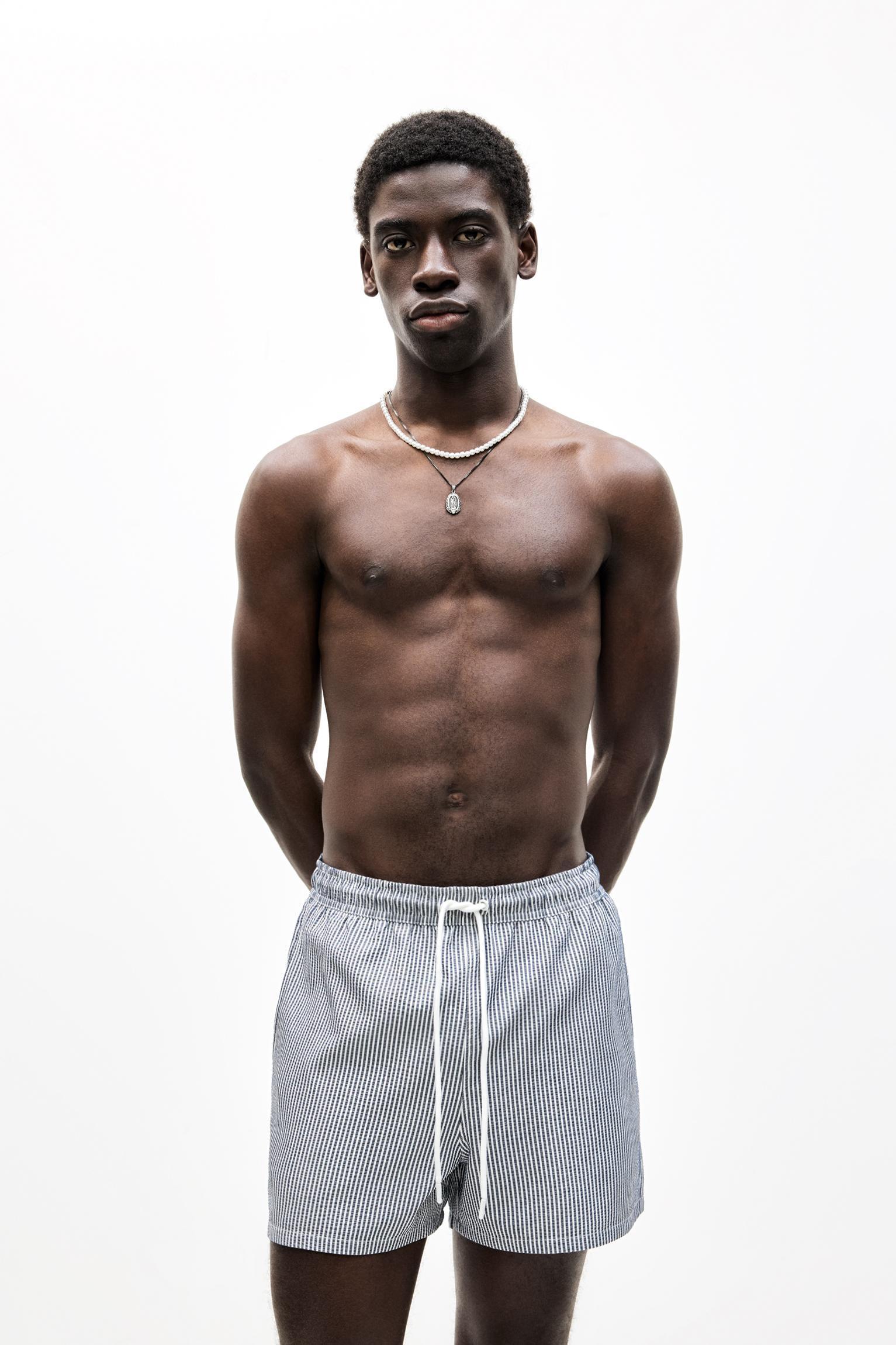 Striped seersucker swimming trunks Product Image