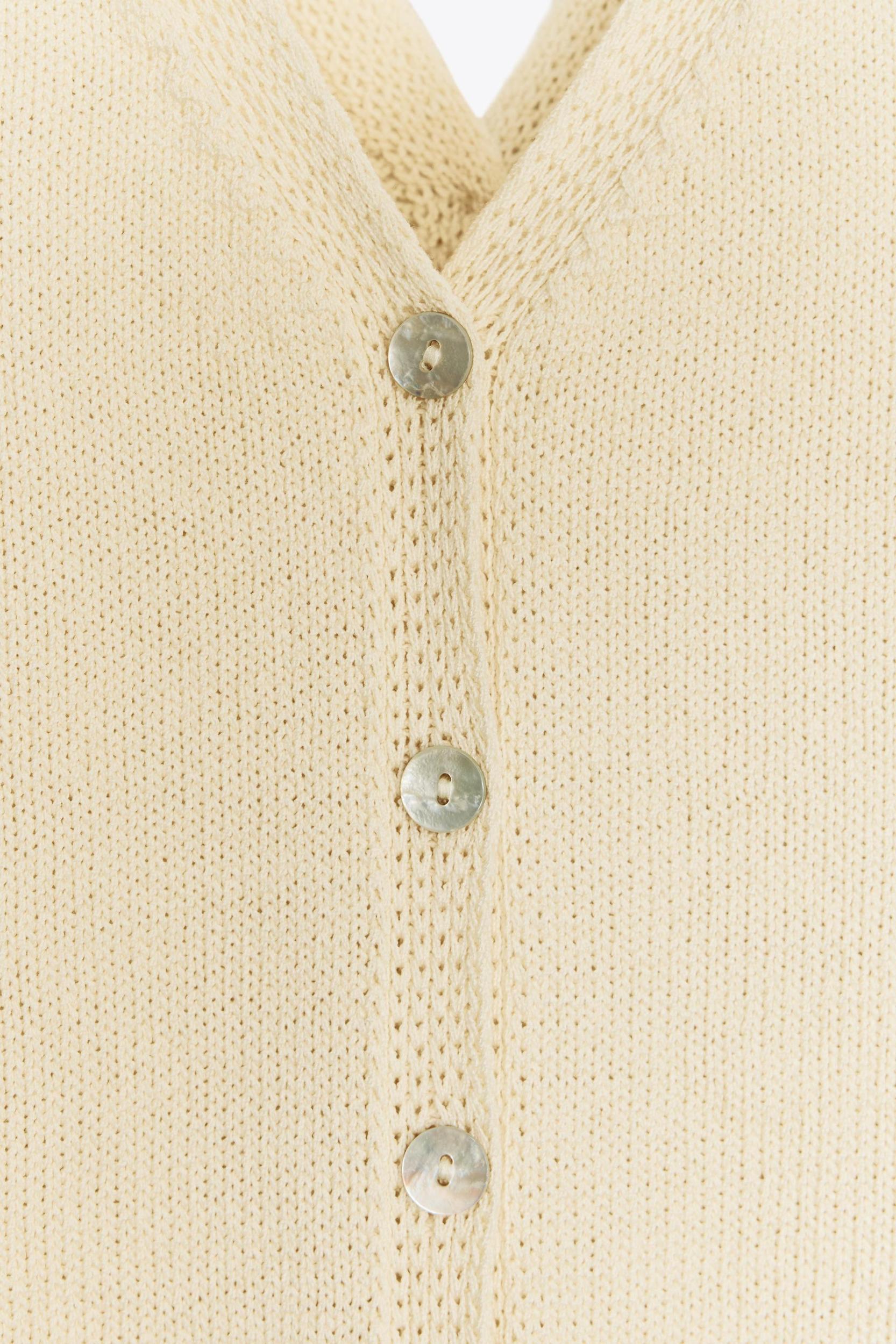 BUTTON KNIT SWEATER Product Image