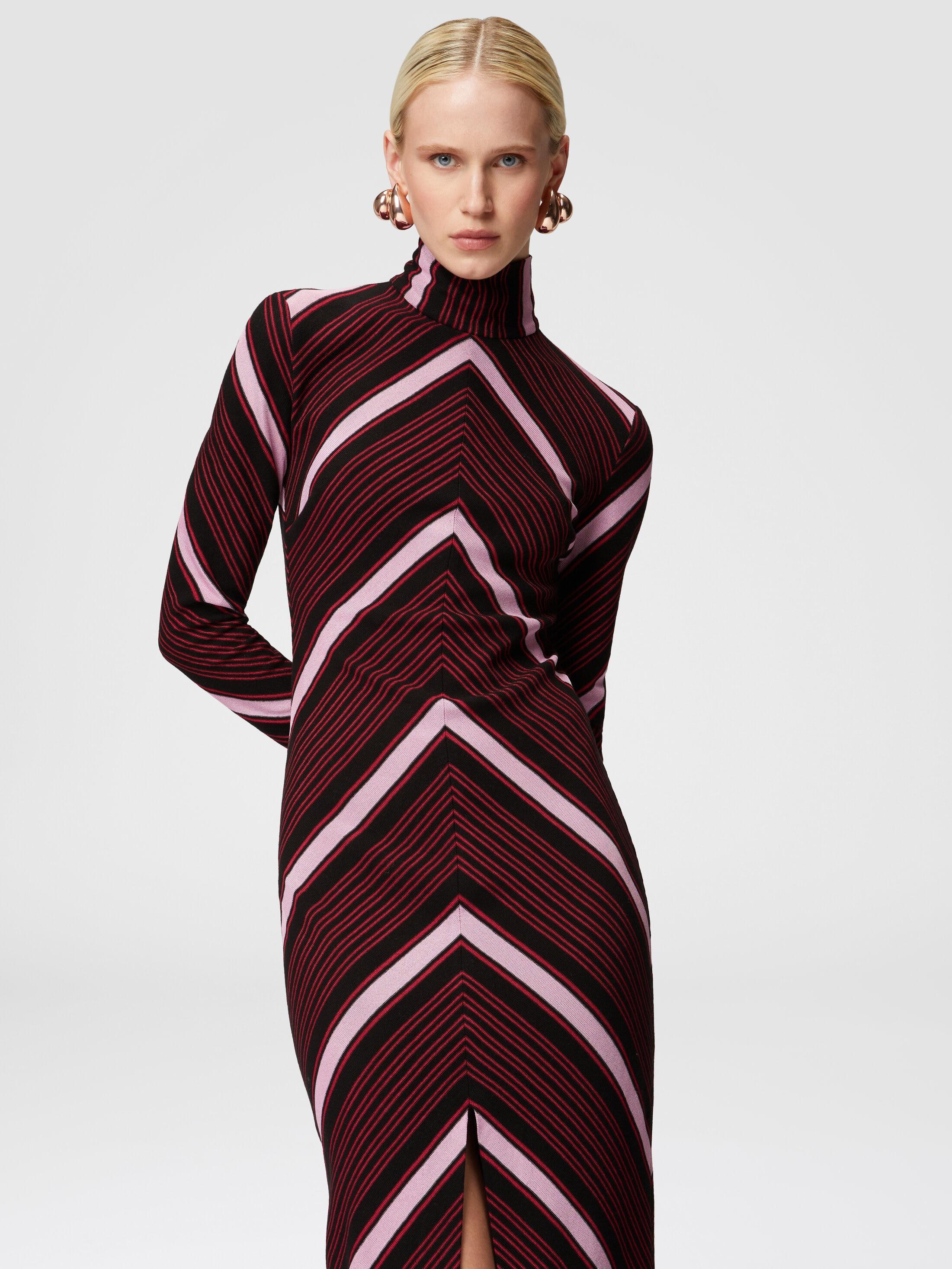 Long turtleneck dress with deep central slit Product Image