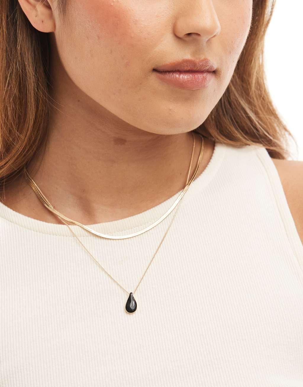 ASOS DESIGN necklace with molten pebble pendant in gold tone Product Image