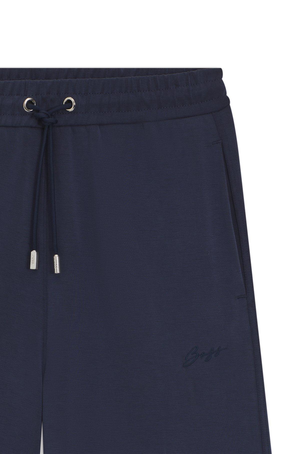 BOSS - Relaxed-fit tracksuit bottoms with embroidered logo - Dark Blue Product Image
