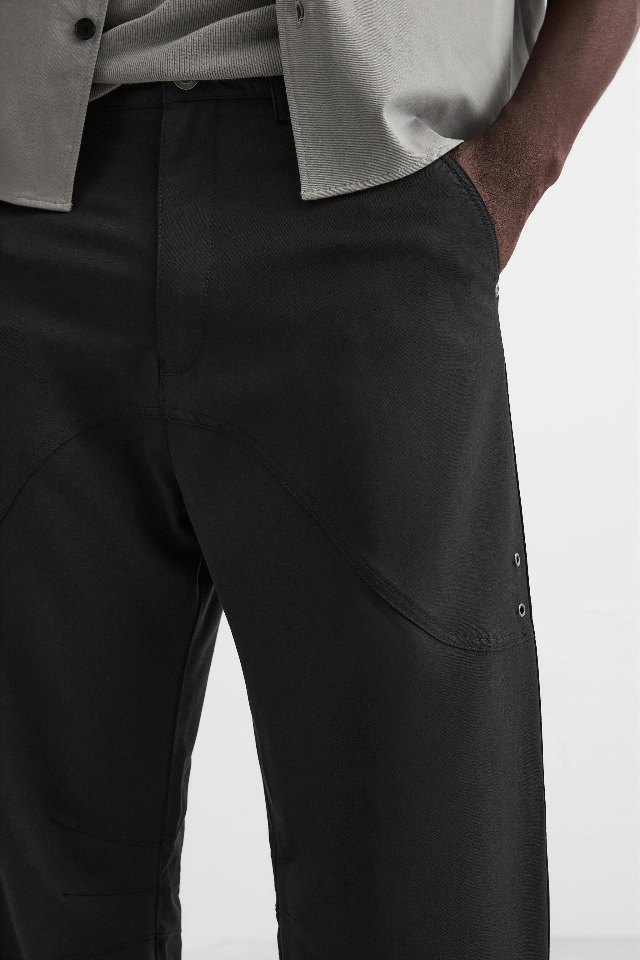 FLARED FIT PANTS WITH SEAMS Product Image