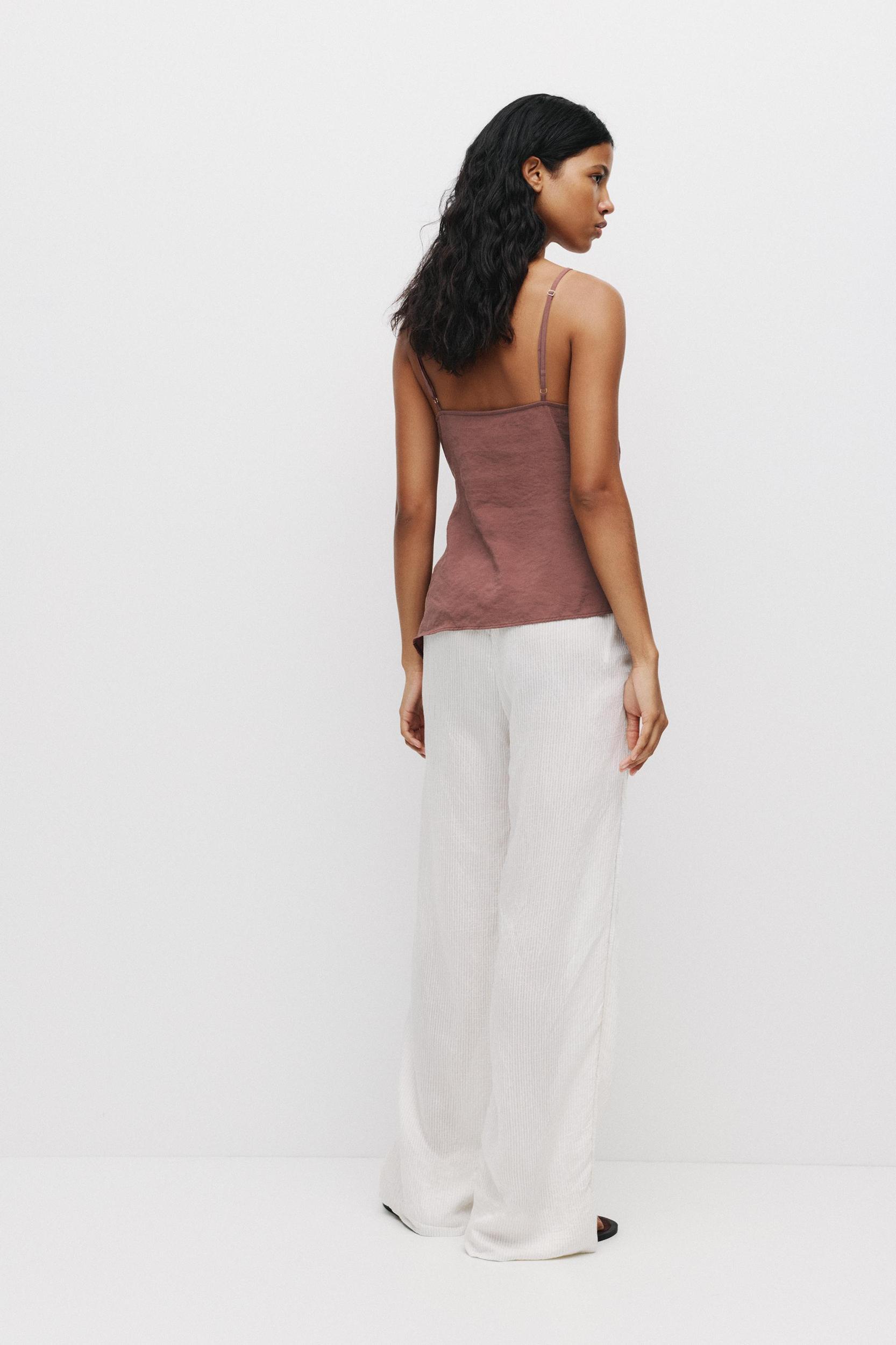 Asymmetric strappy top Product Image
