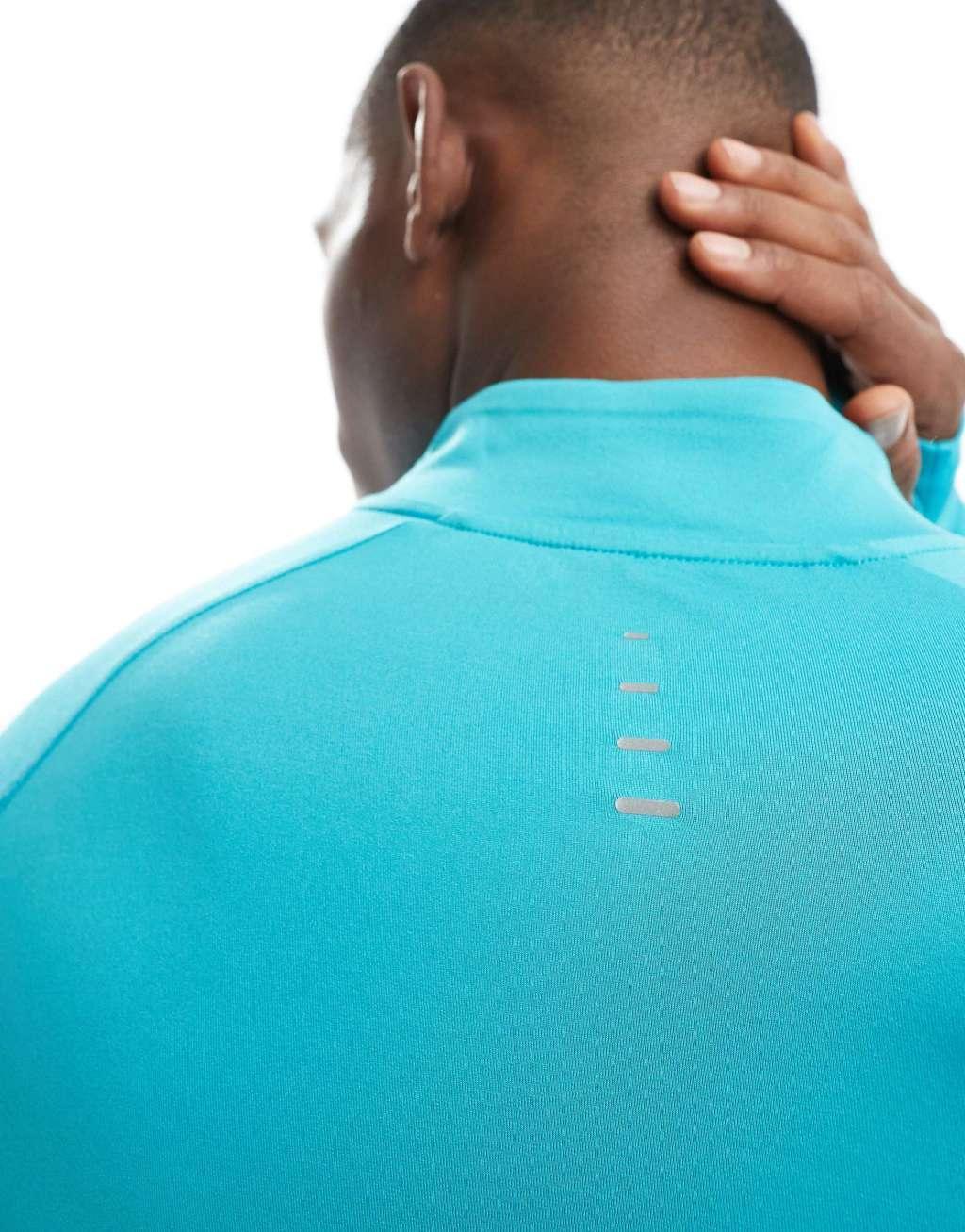 Nike Running Stride half zip sweatshirt in light blue Product Image