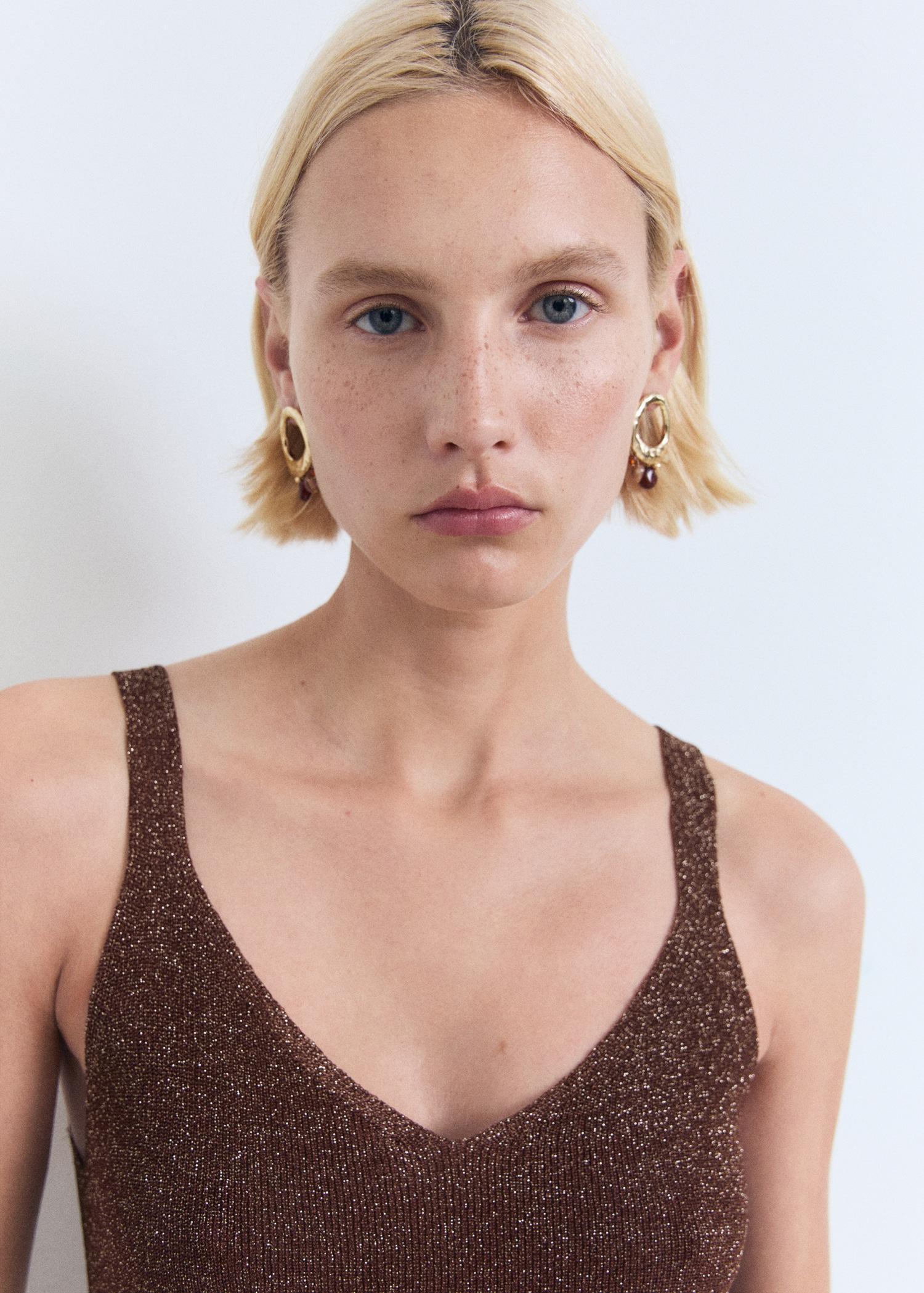 Lurex knitted V-neck top - Women | MANGO USA Product Image