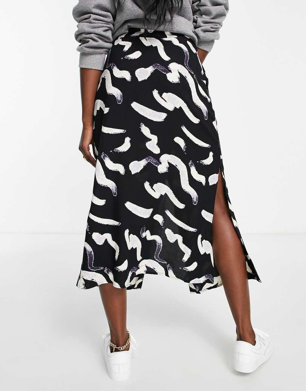 ASOS DESIGN button through midi skirt in mono smudge print Product Image