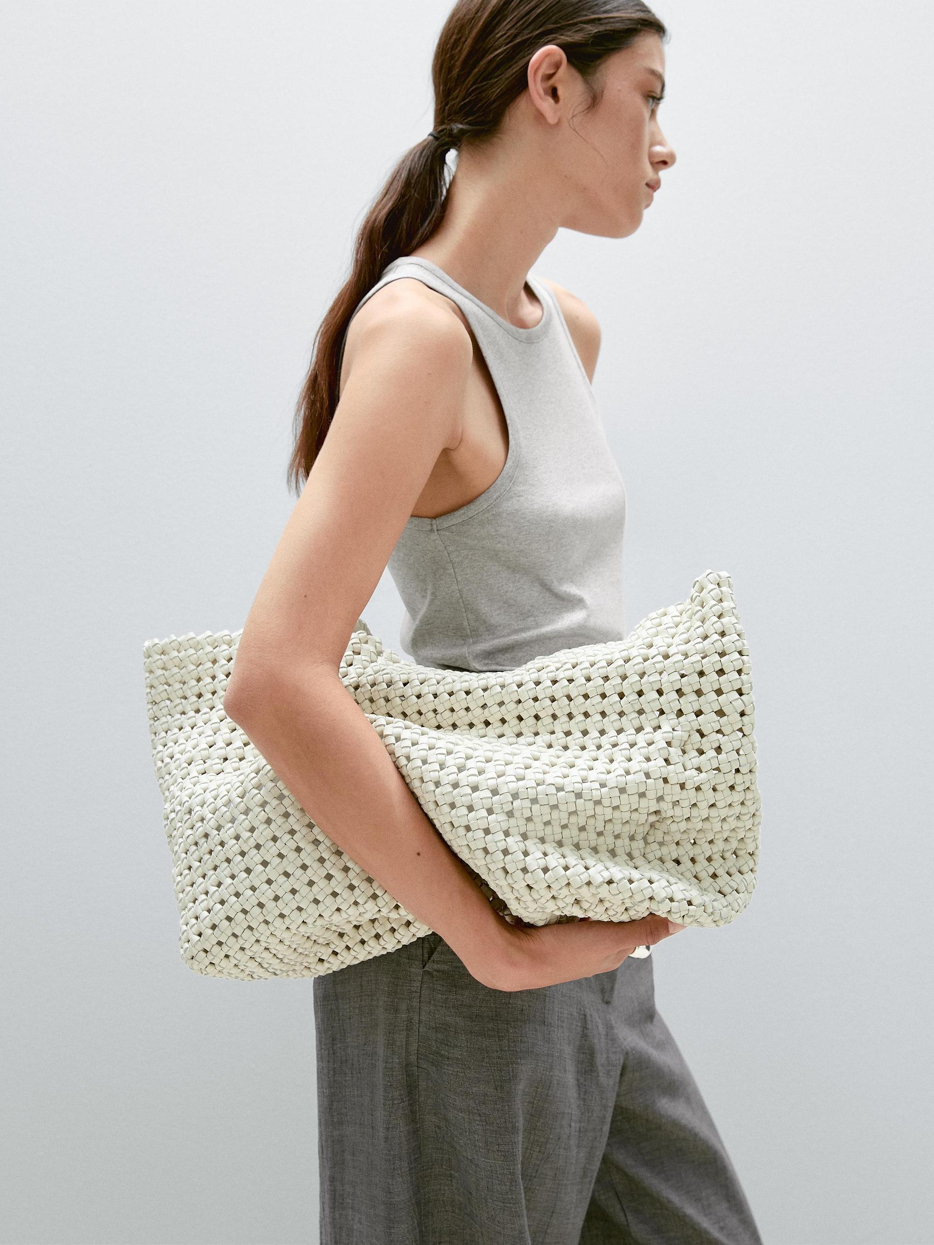 Balloon fit trousers with button details Product Image