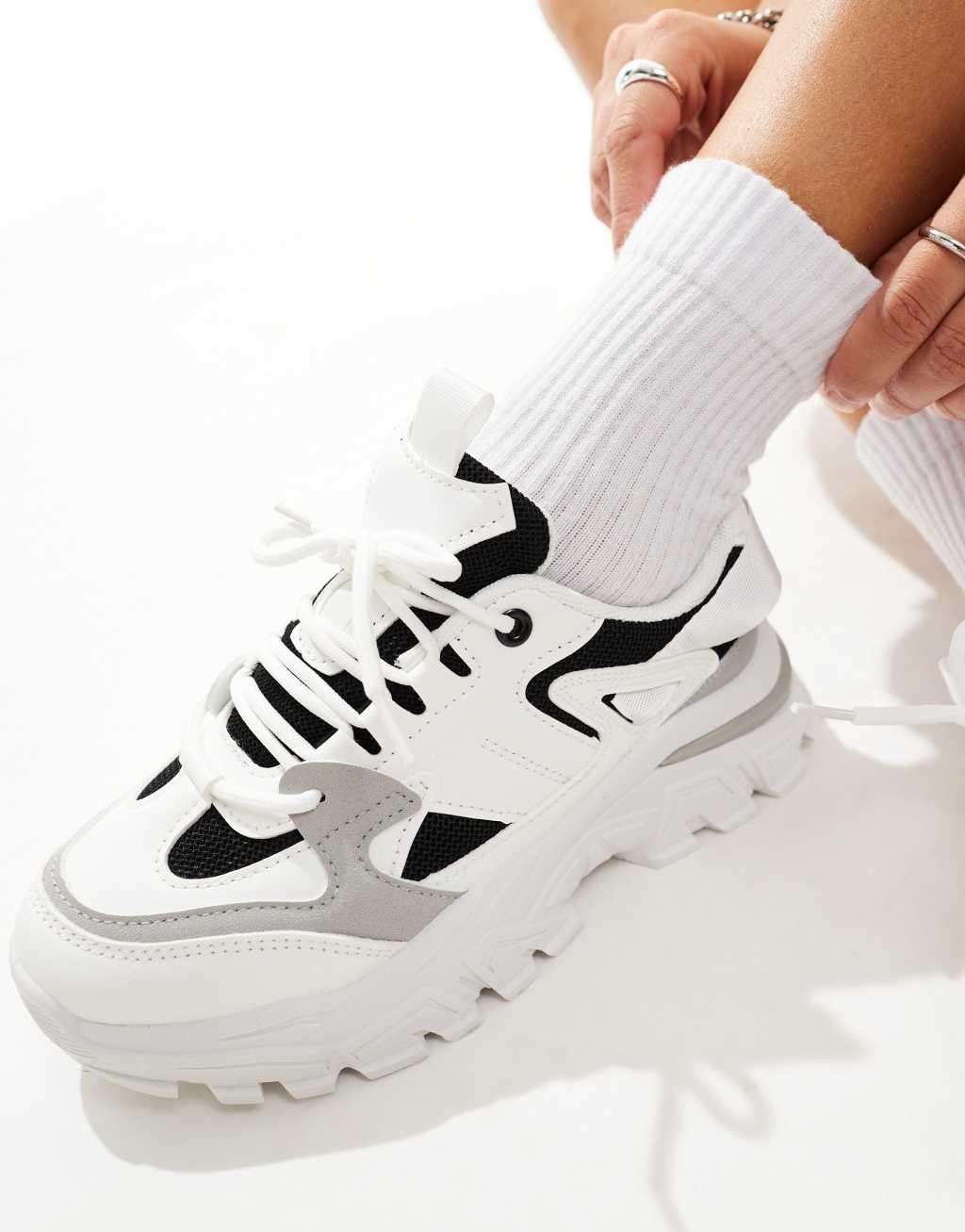 SEQWL chunky sneakers in silver with black details  Product Image