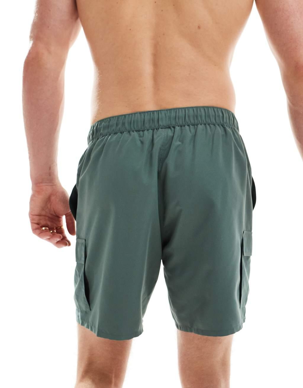 ASOS DESIGN swim shorts in mid length with cargo pockets in khaki Product Image