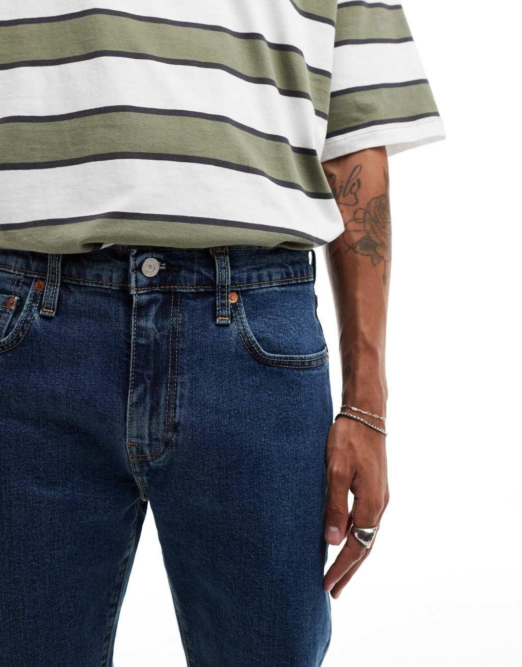 Levi's 502 taper fit jeans in mid blue Product Image