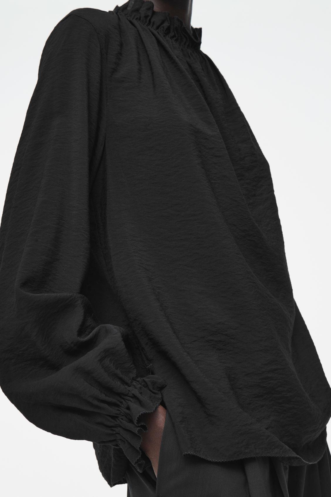 RUFFLED HIGH-NECK BLOUSE Product Image