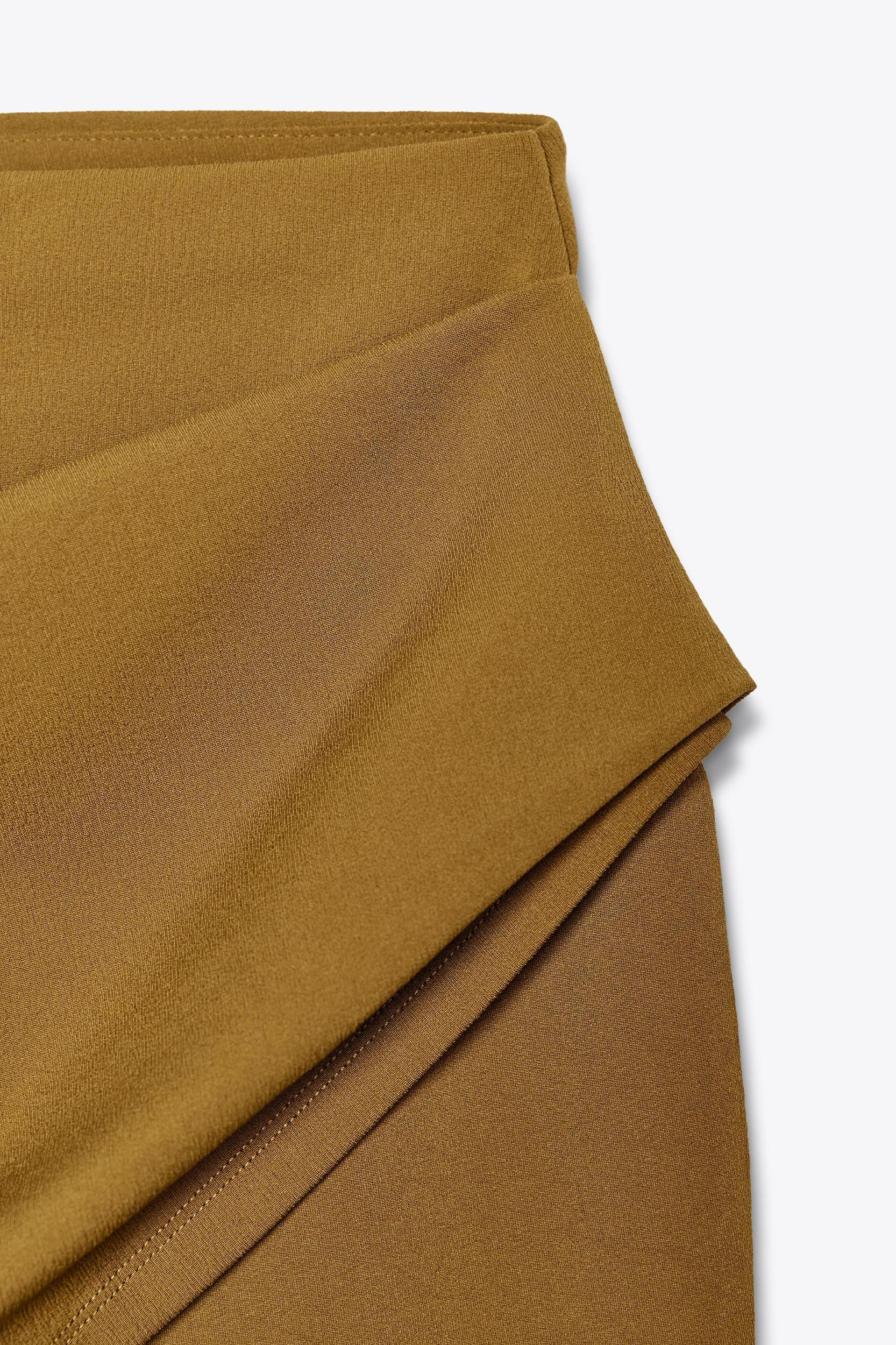 DRAPED WAIST FLARE PANTS Product Image