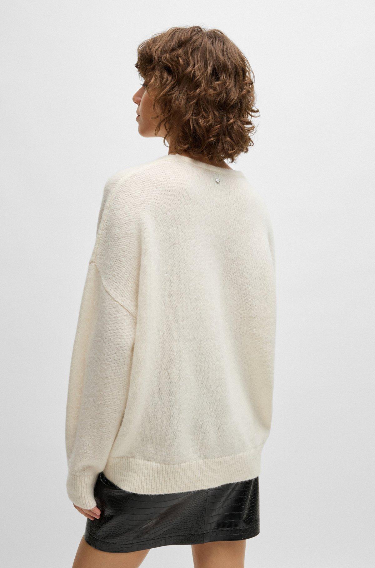 Wool-blend relaxed-ft sweater with V neckline Product Image
