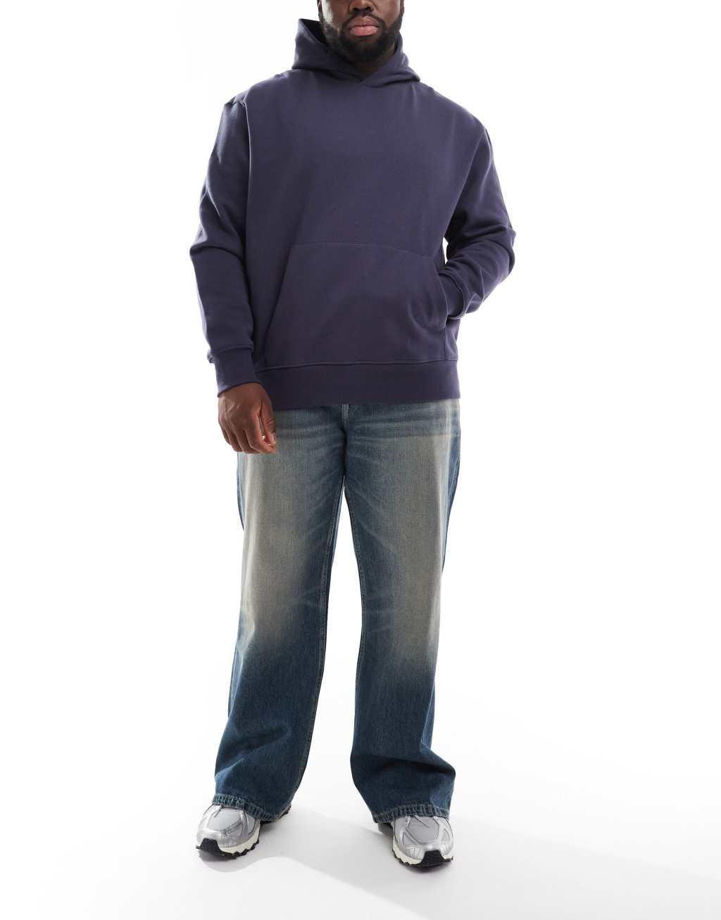 ASOS DESIGN wide flare jeans with tint in mid wash blue Product Image