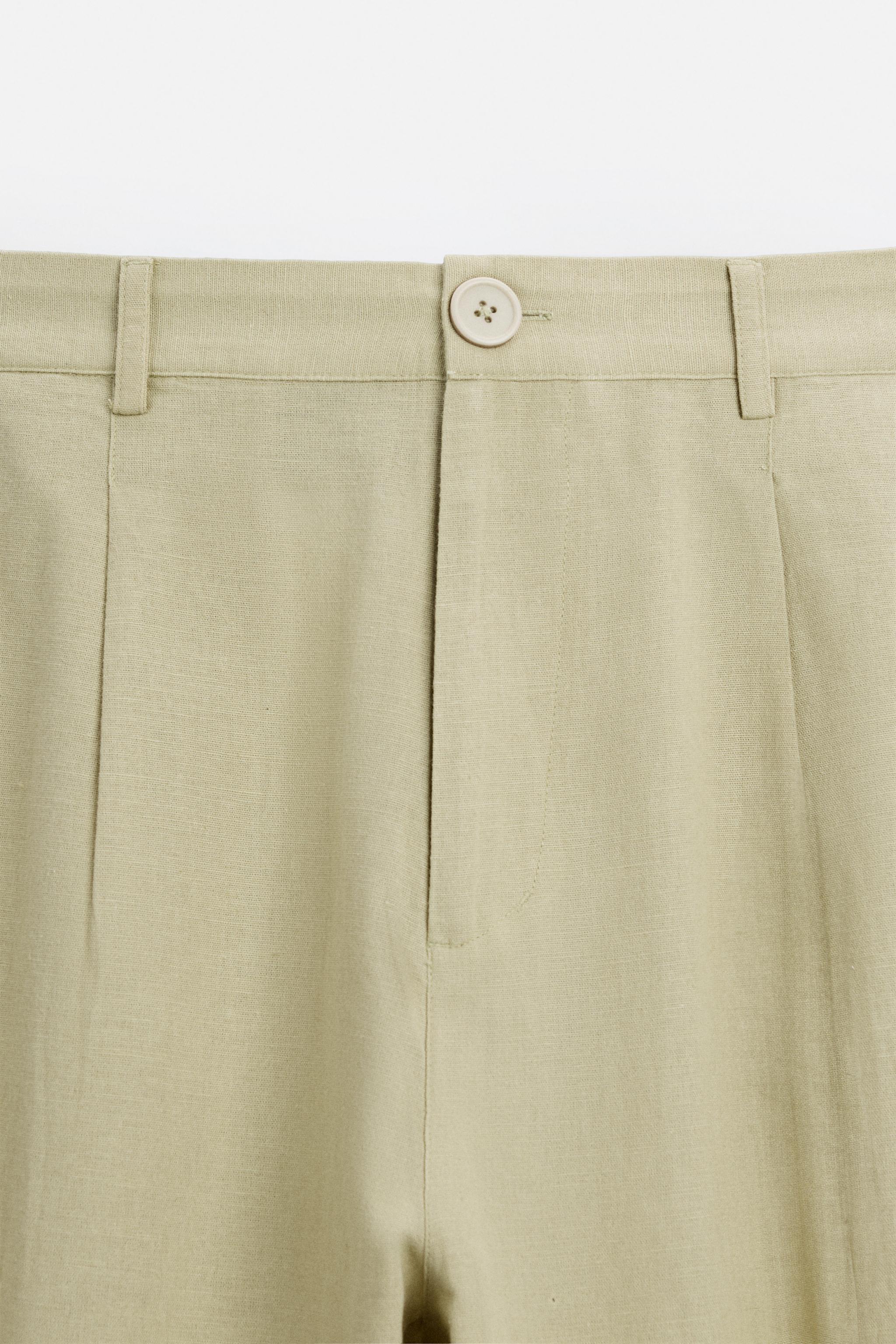 RELAXED FIT PLEATED PANTS Product Image