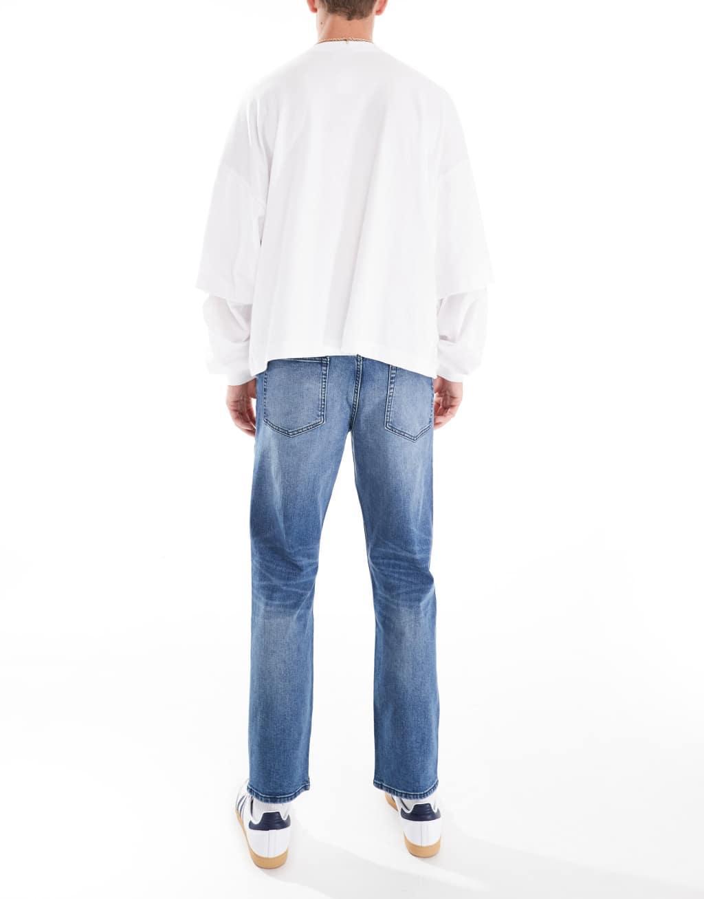 ASOS DESIGN slim jeans with tint in mid wash blue Product Image