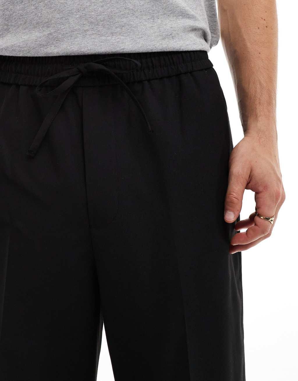 ASOS DESIGN pull on smart wide leg pants in black Product Image