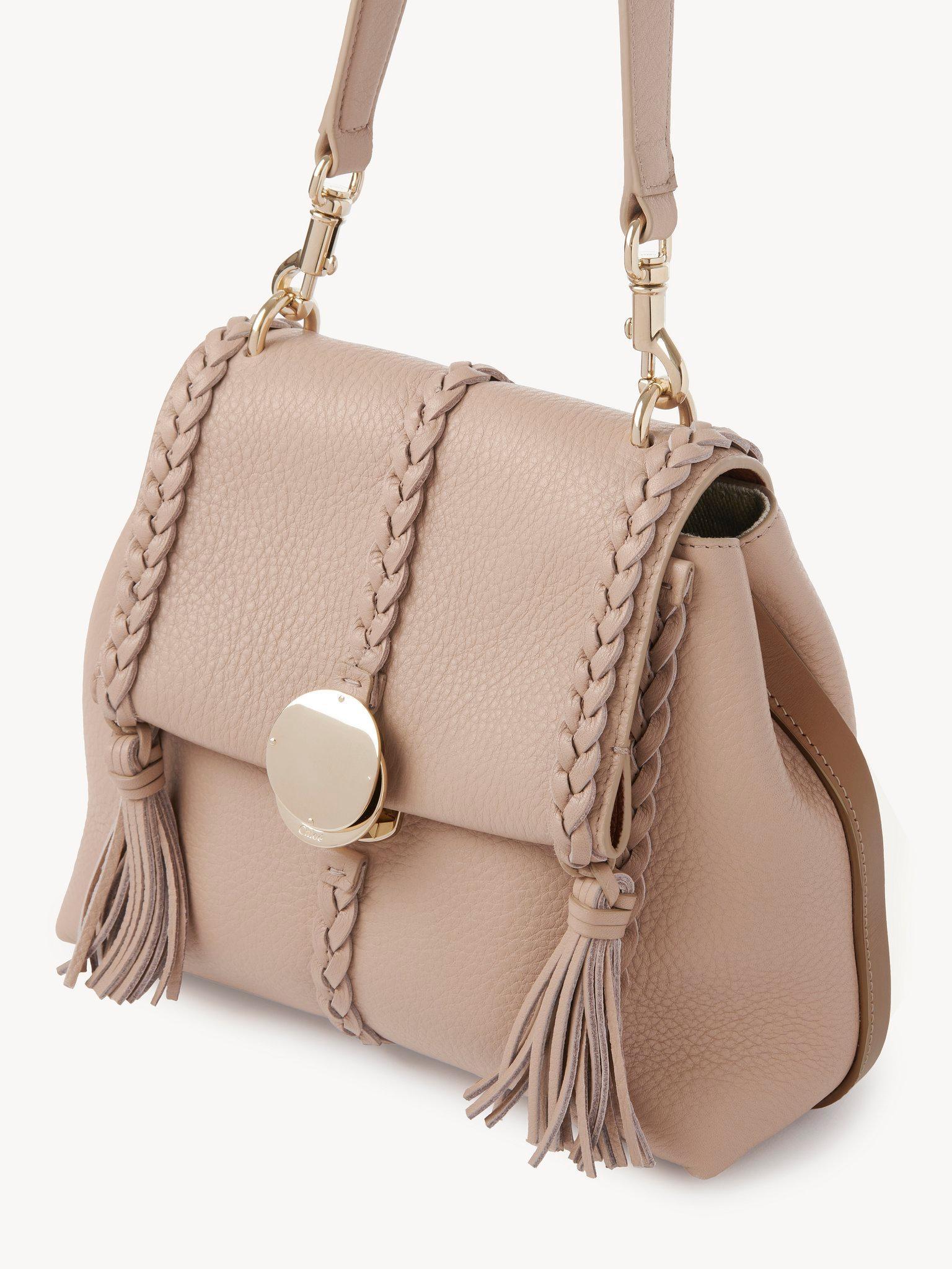 Small Penelope soft shoulder bag in grained leather Product Image