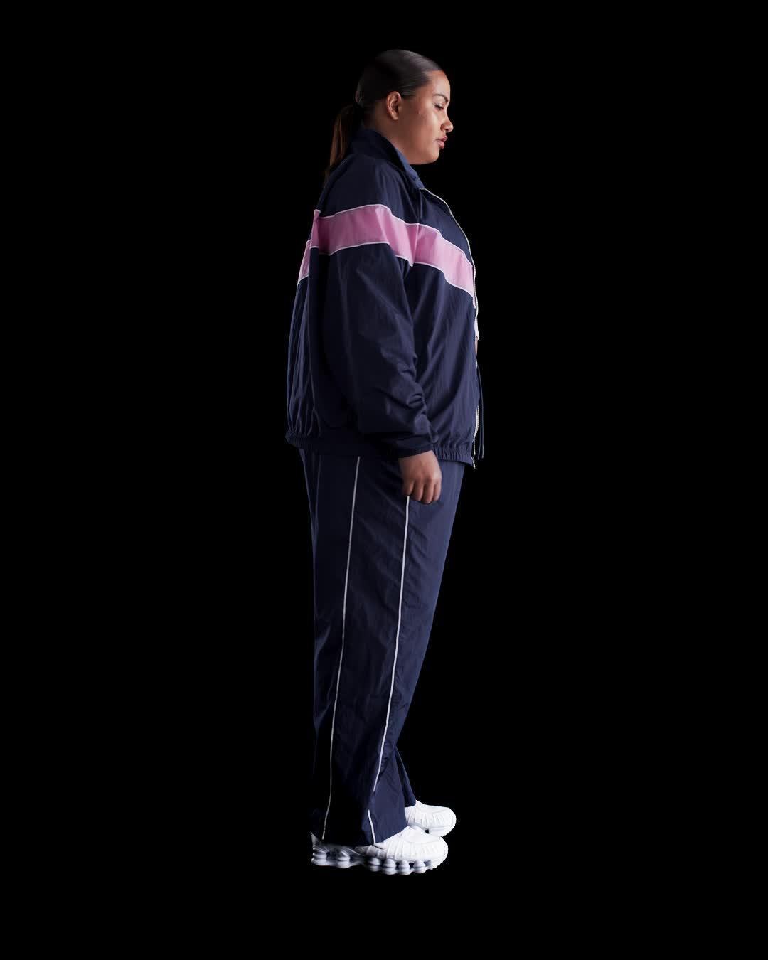 Nike Womens Windrunner High-Waisted Woven Open-Hem Pants (Plus Size) | FV7657-410 Product Image