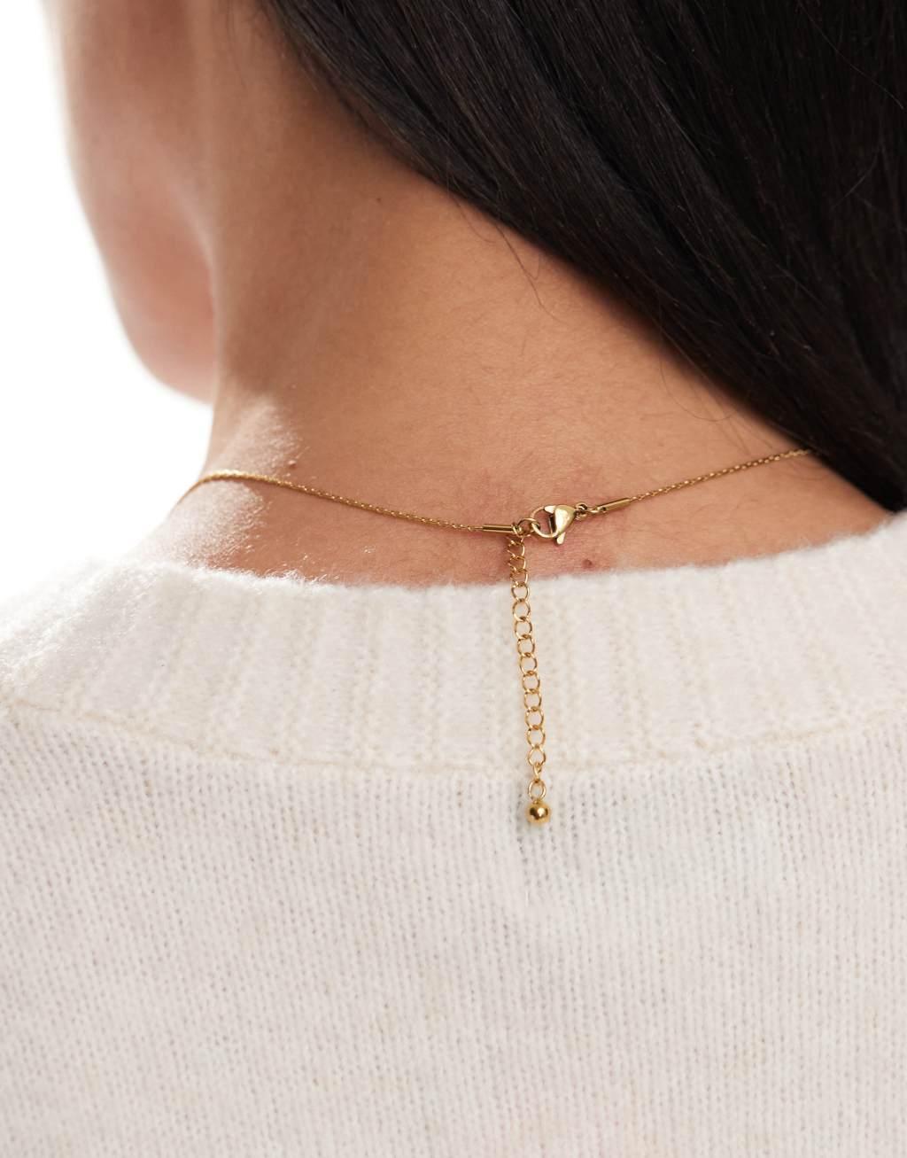 ASOS DESIGN stainless steel necklace with cubic zirconia pendant in gold tone with gift bag Product Image