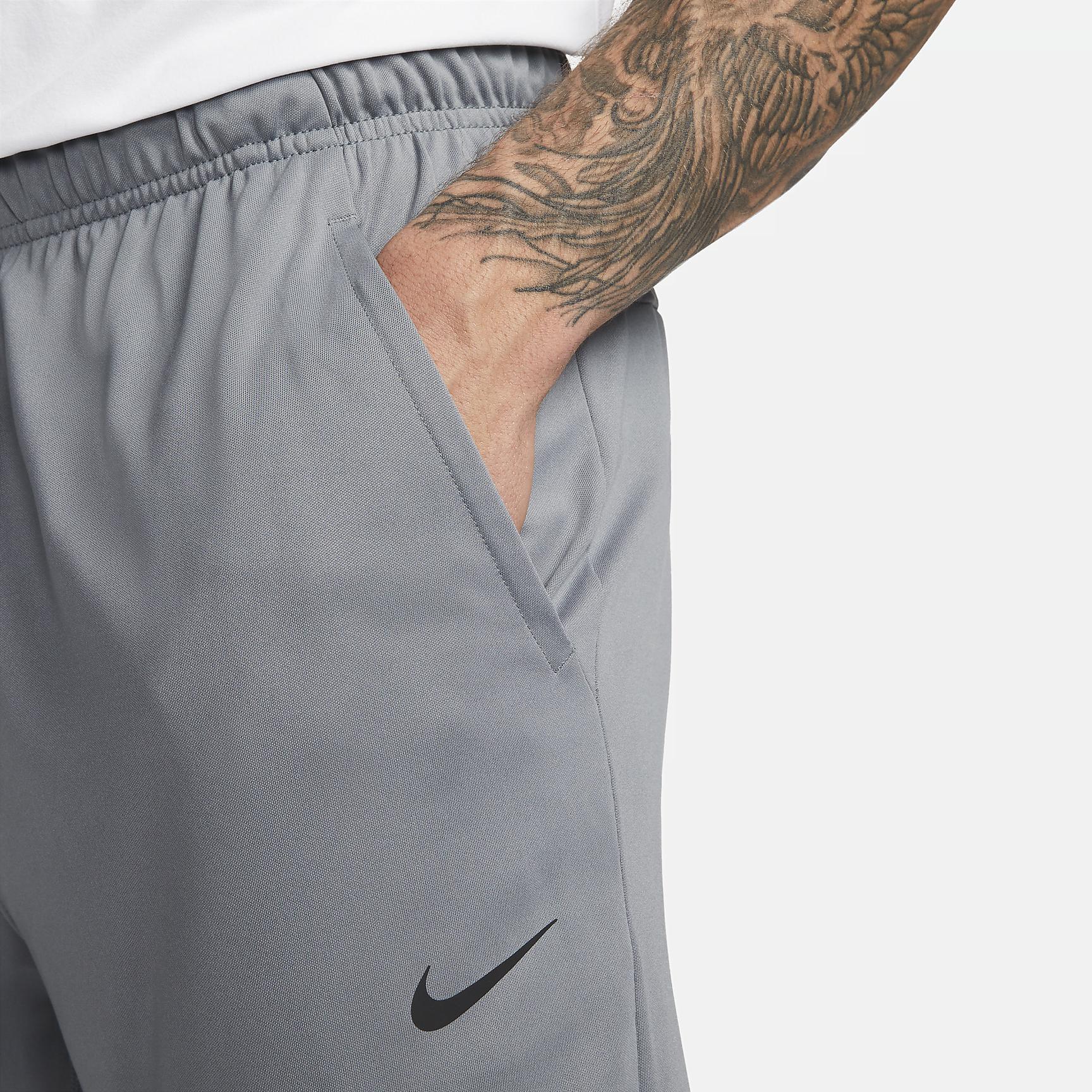 Nike Mens Totality Dri-FIT Tapered Versatile Pants | FB7509-084 Product Image