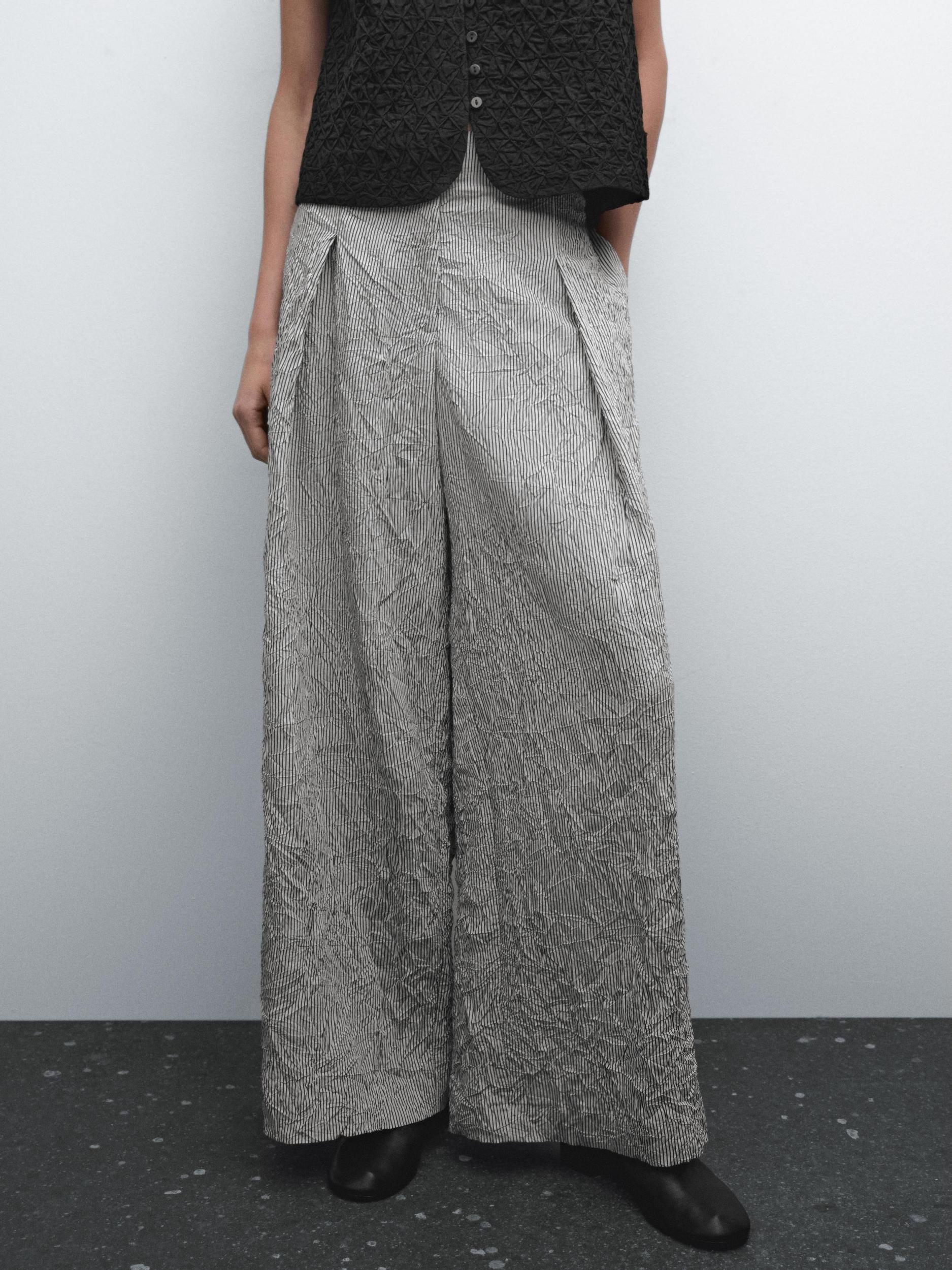 Striped voluminous fabric trousers Product Image