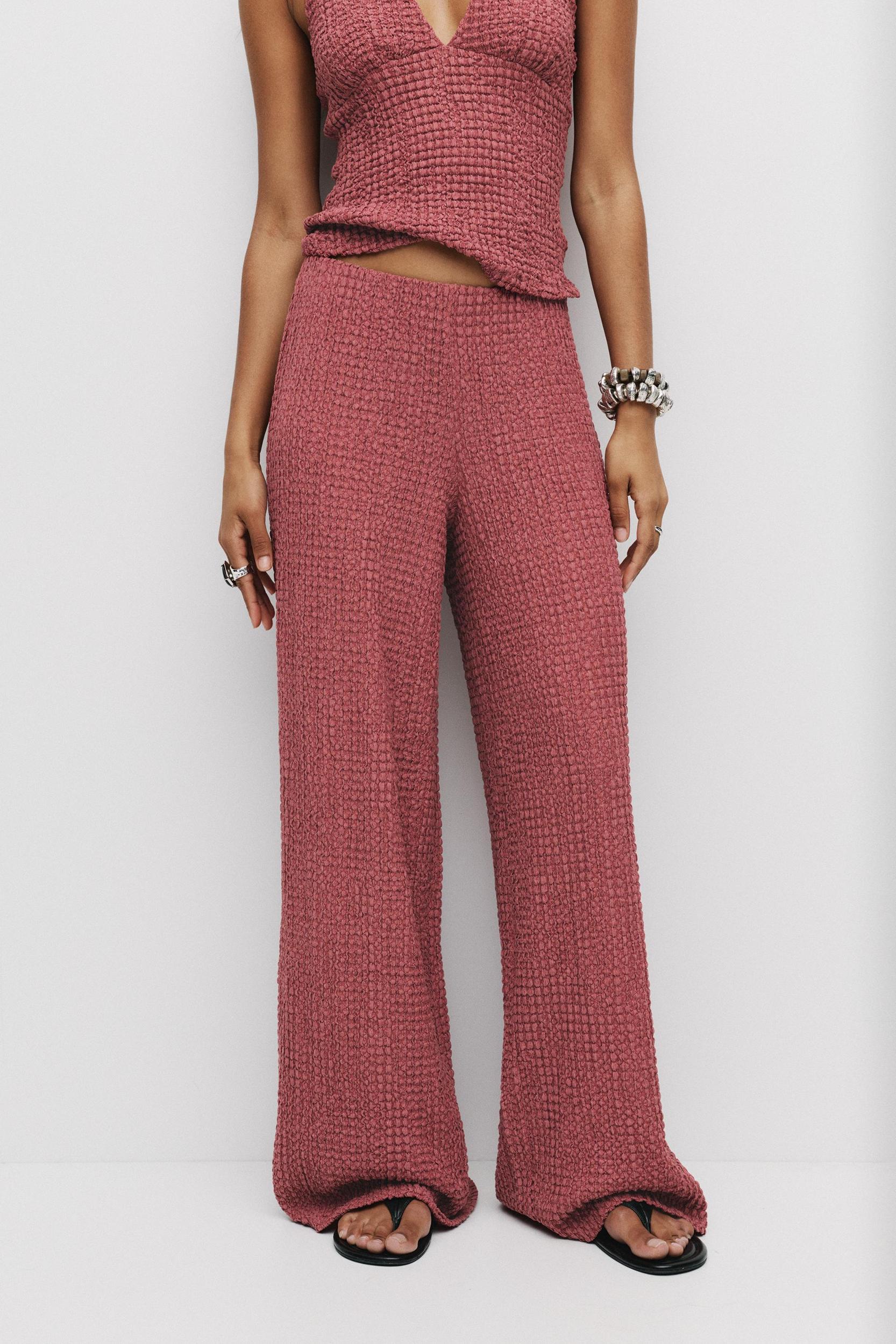 Rustic creased-effect pants Product Image