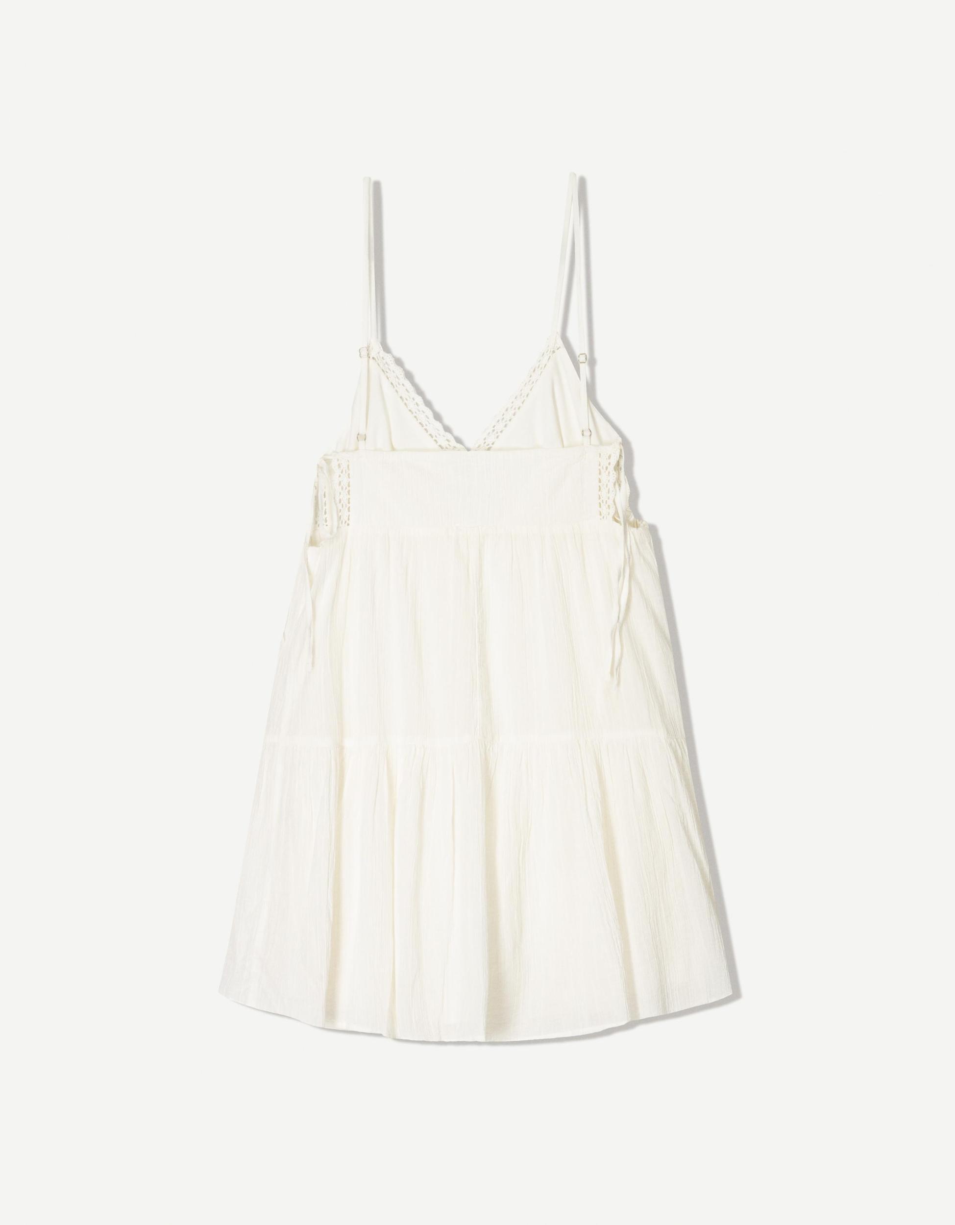 Textured mini dress with lace trim Product Image