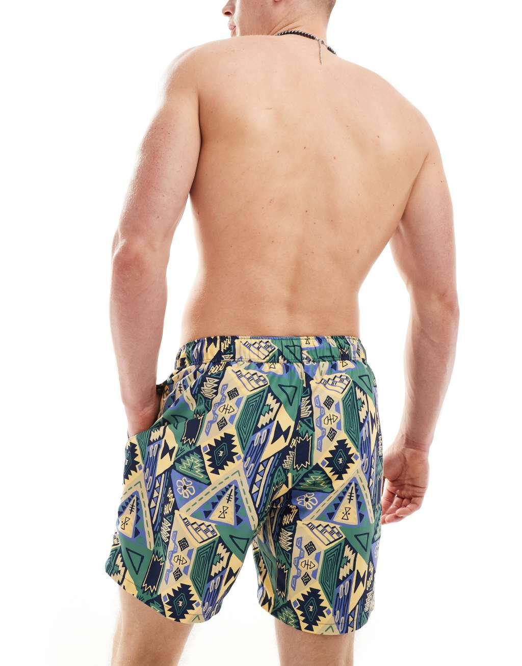 ASOS DESIGN swim shorts in mid length in abstract print in blue Product Image