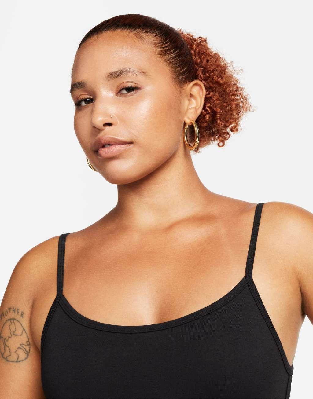 Nike one piece jumpsuit with tape detail Product Image