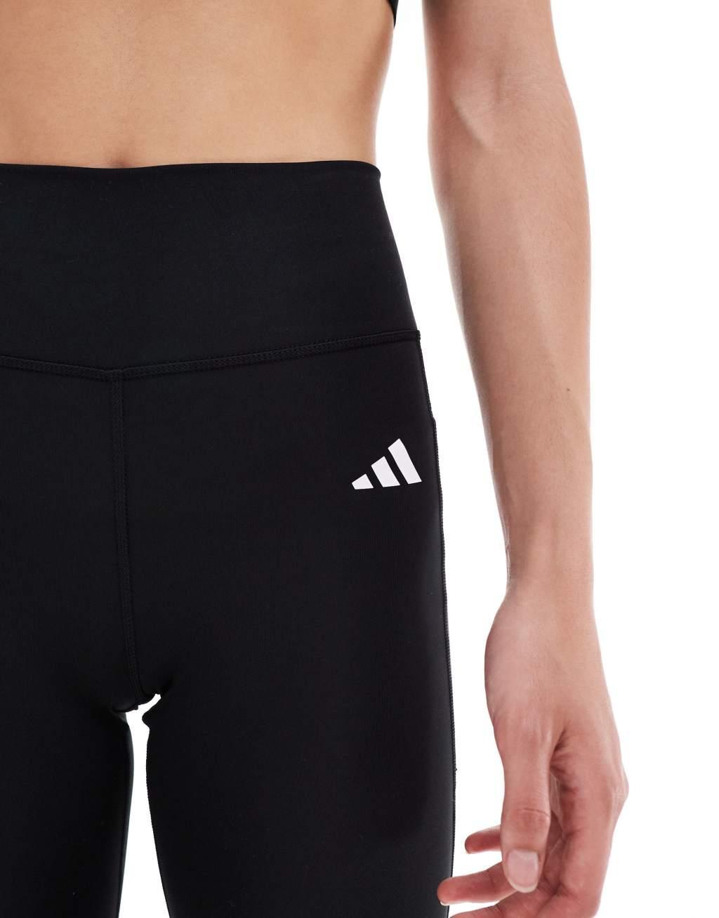 adidas Performance Optime Essentials stash pocket full length leggings in black Product Image