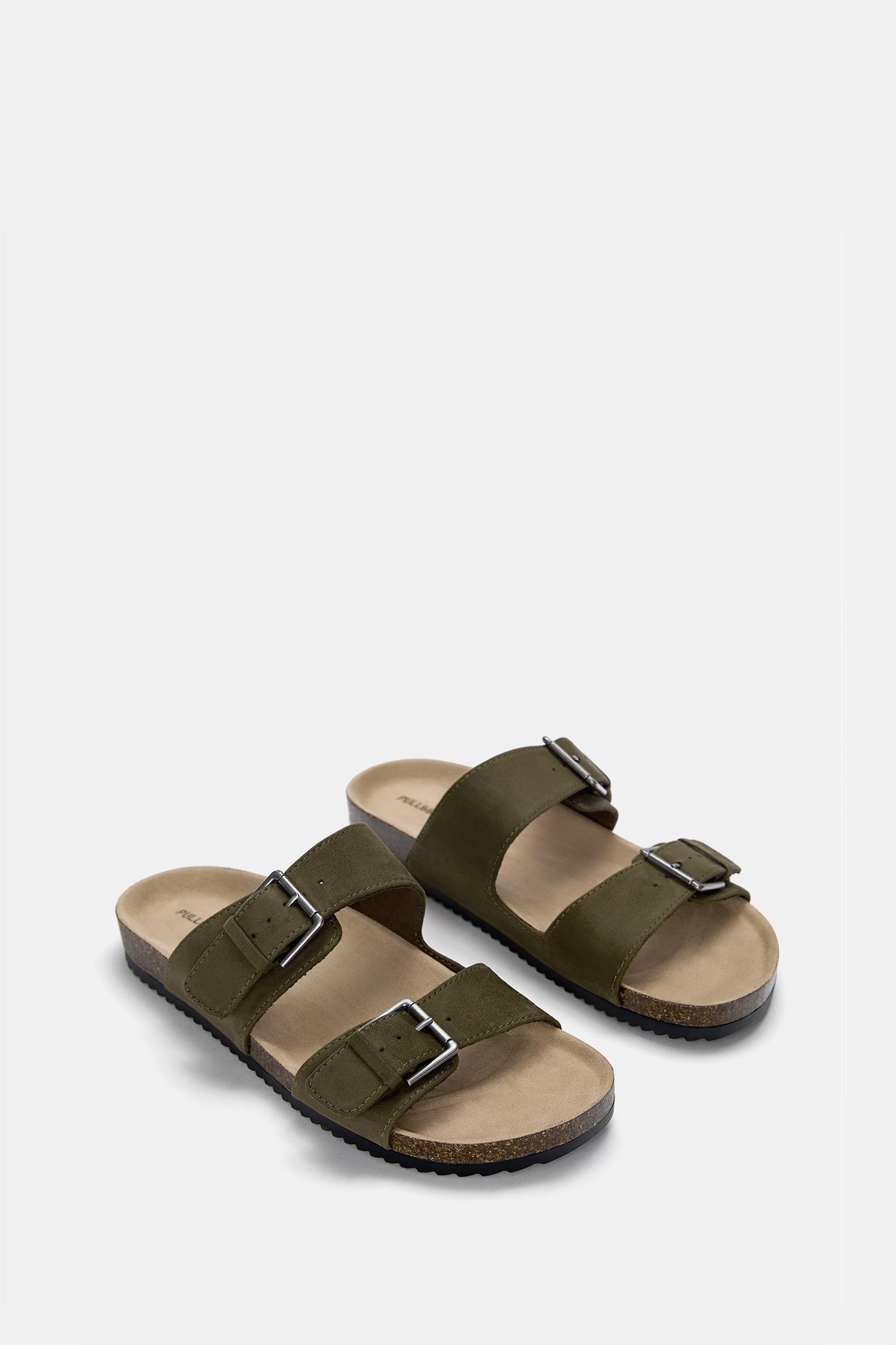 Flat sandals with buckles Product Image