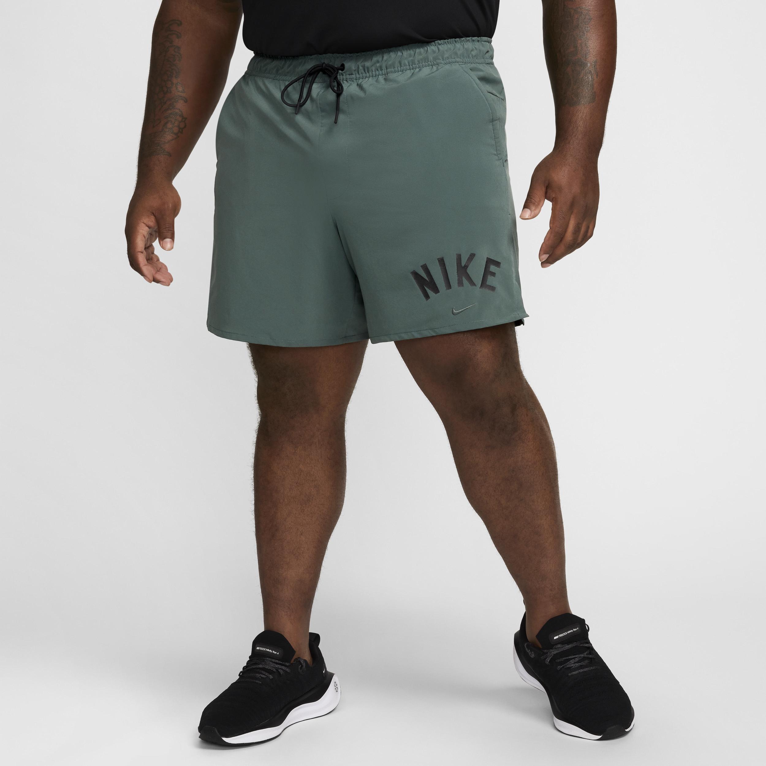 Nike Men's Unlimited Swoosh 7" Dri-FIT Unlined Versatile Shorts Product Image