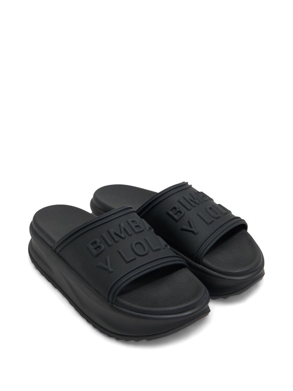 logo-embossed slides Product Image