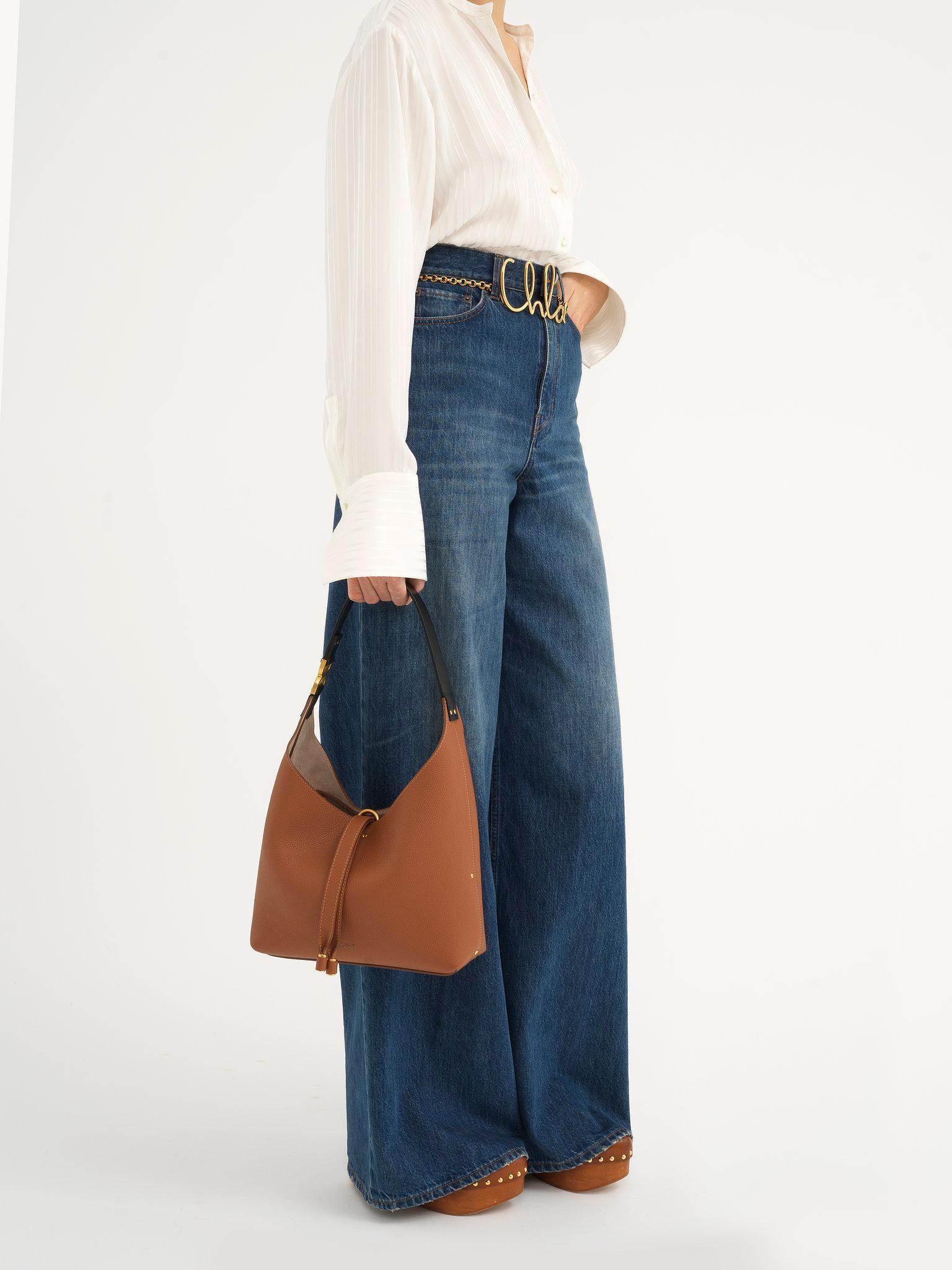 Small Marcie hobo bag in grained leather Product Image