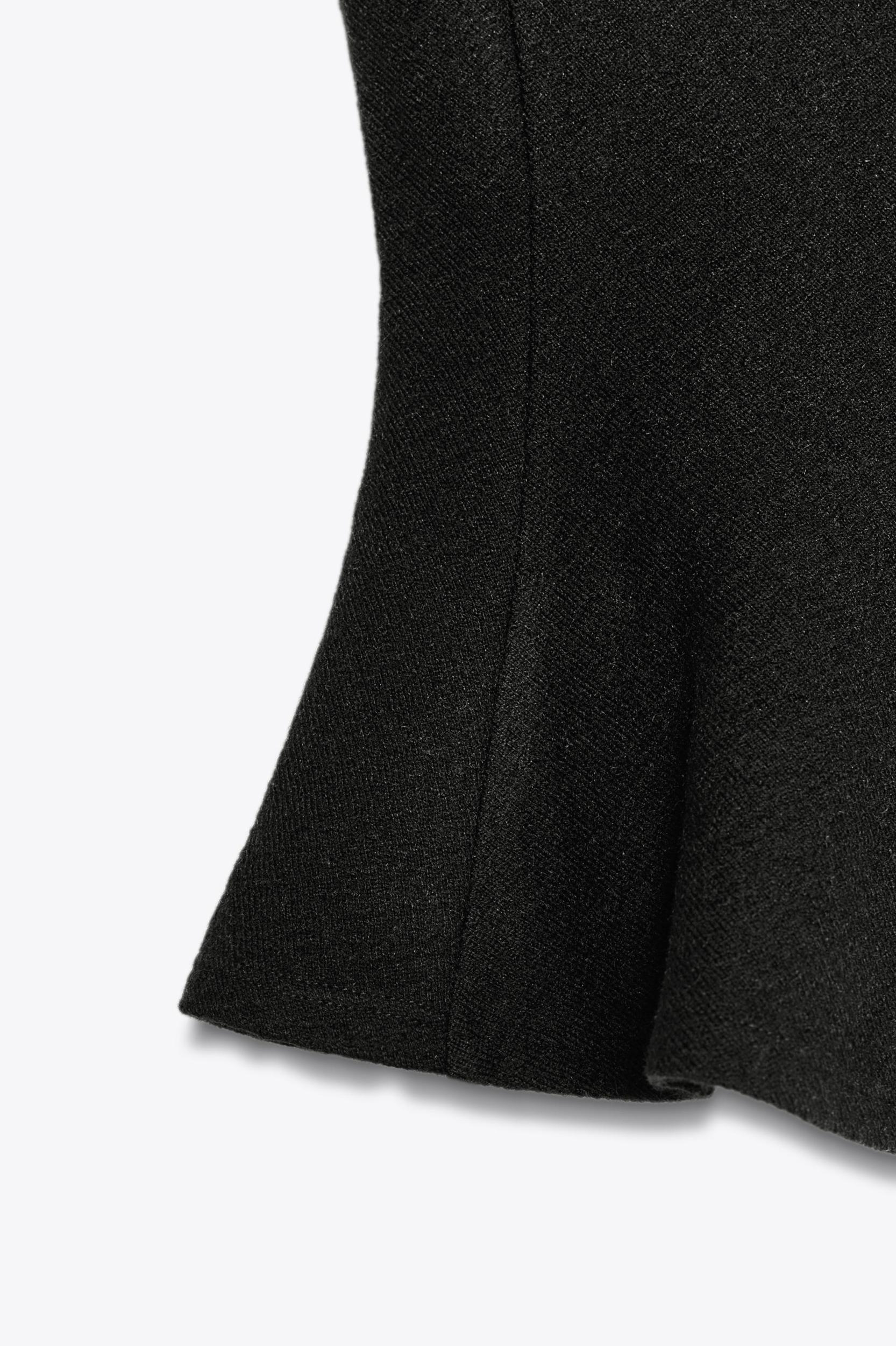 TEXTURED PEPLUM TOP Product Image