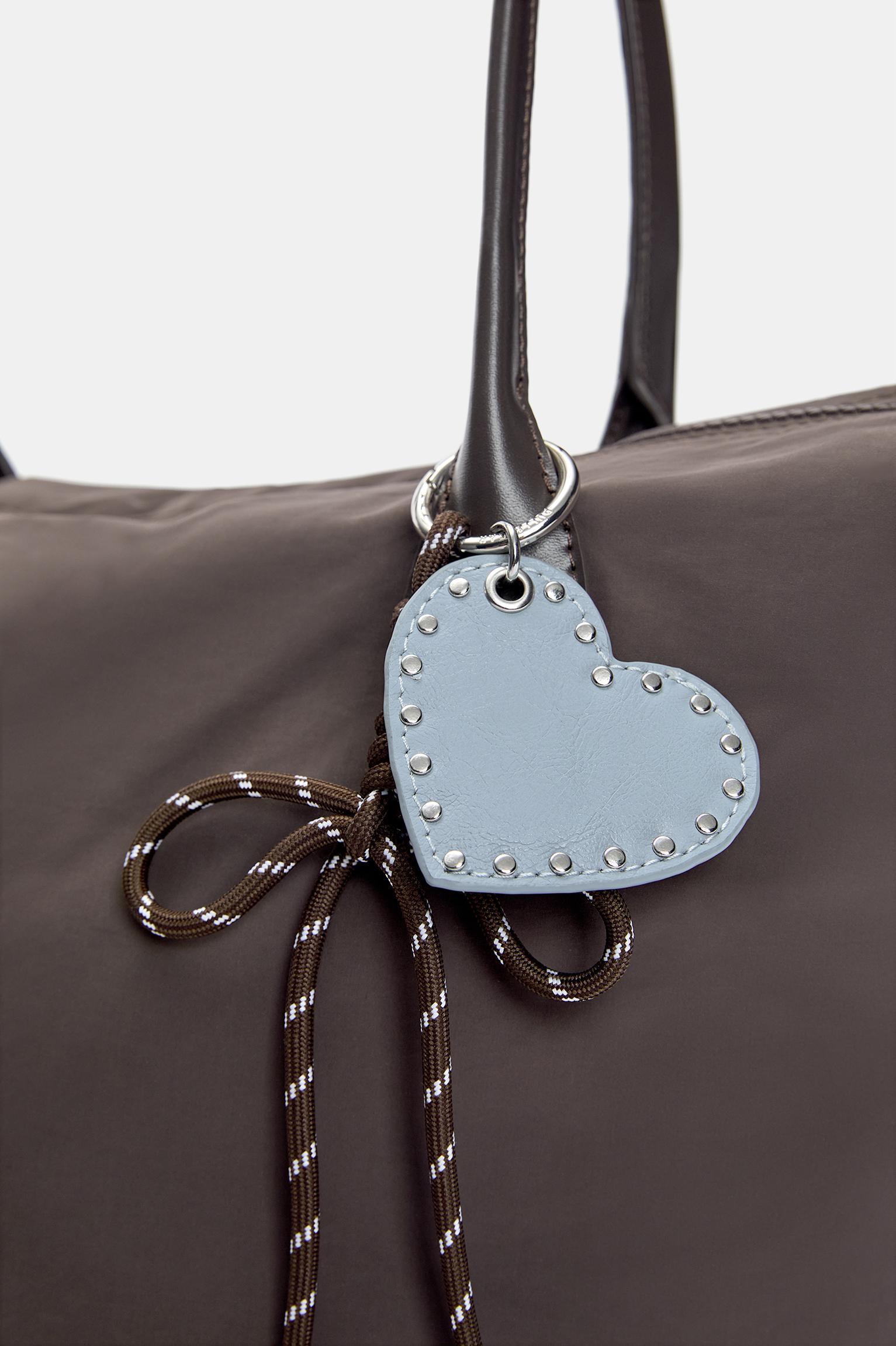 Nylon shopper bag with charm detail Product Image