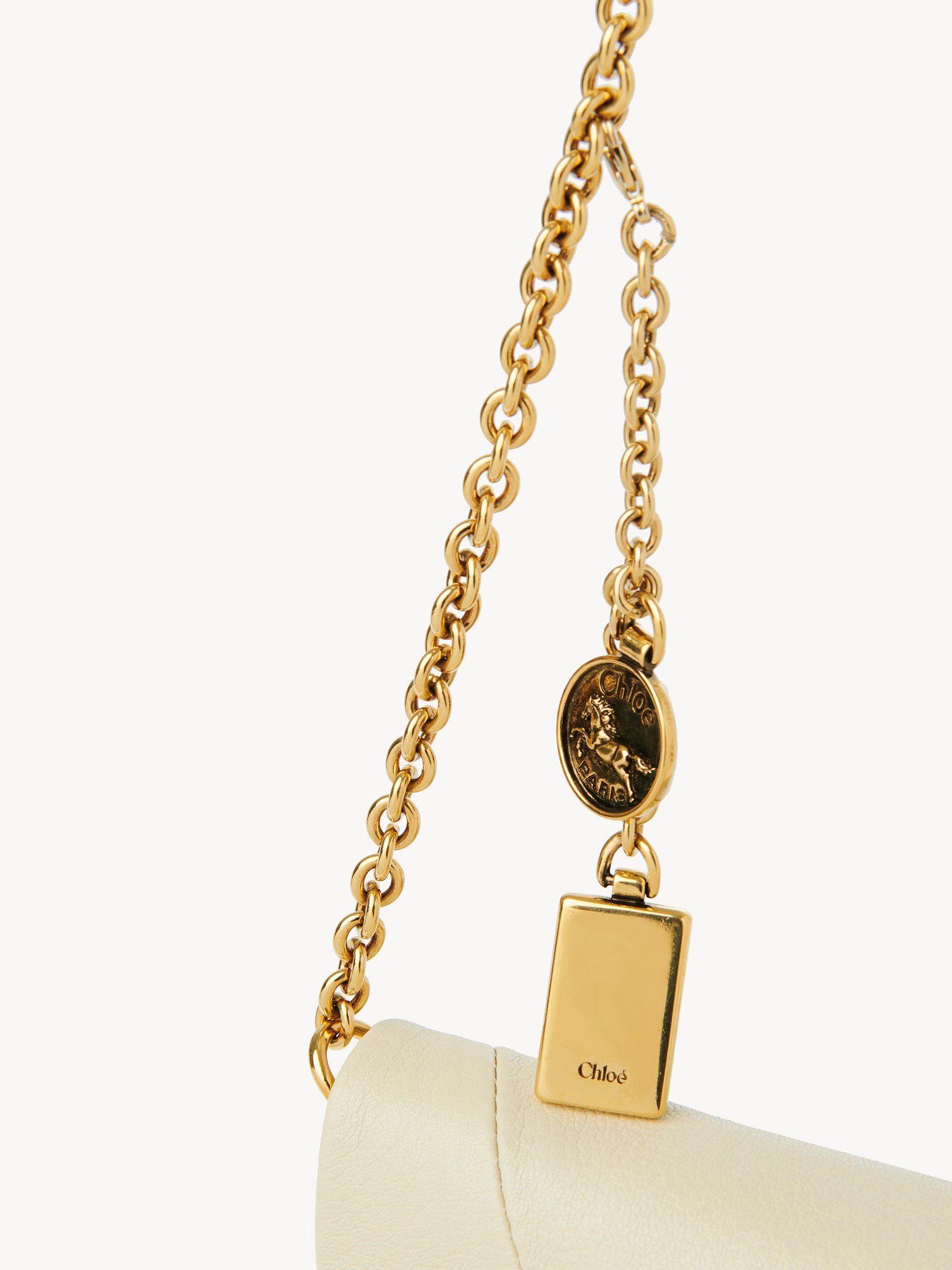 Chloé Spin flap wallet on chain in grained leather Product Image