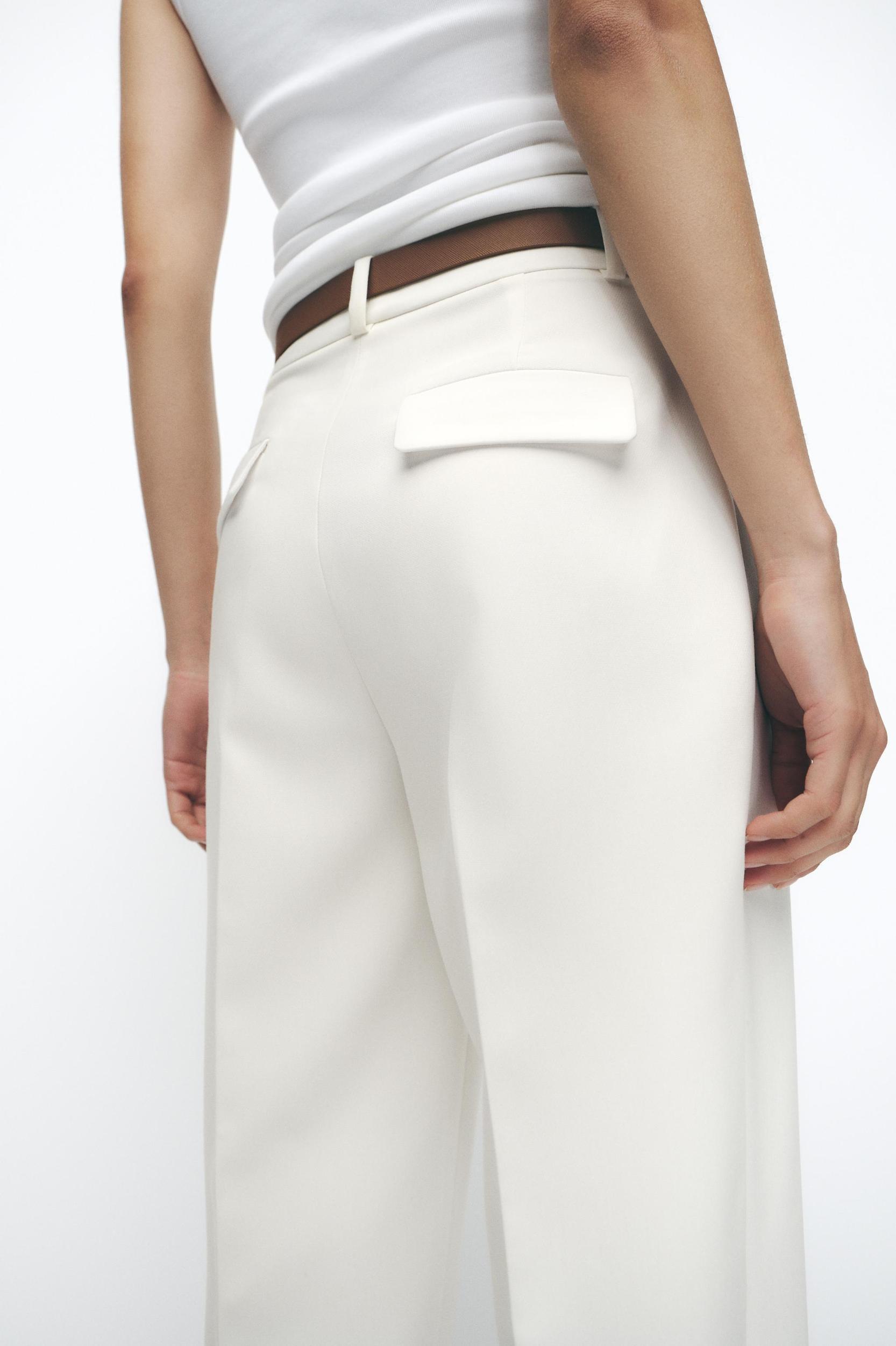 PLEATED BELTED PANTS Product Image