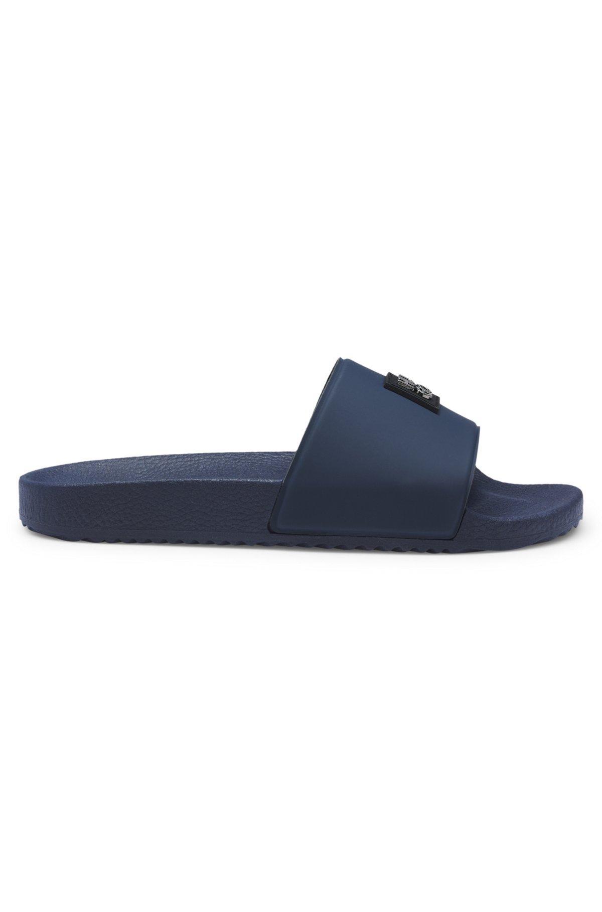 Italian-made slides with contrast-logo strap Product Image